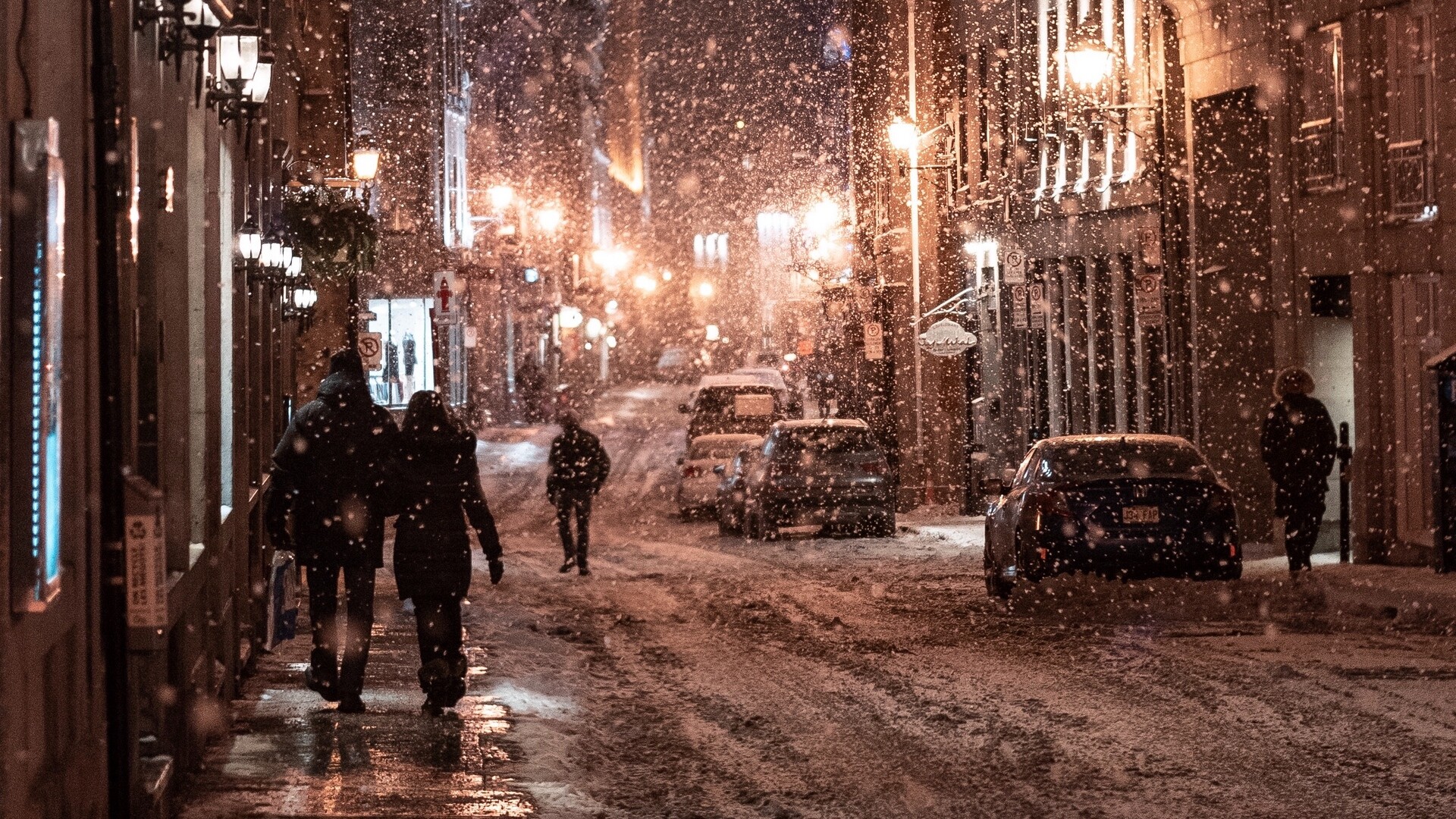 Nighttime snowfall, City street covered in snow, Winter cityscape, Captivating evening view, 1920x1080 Full HD Desktop