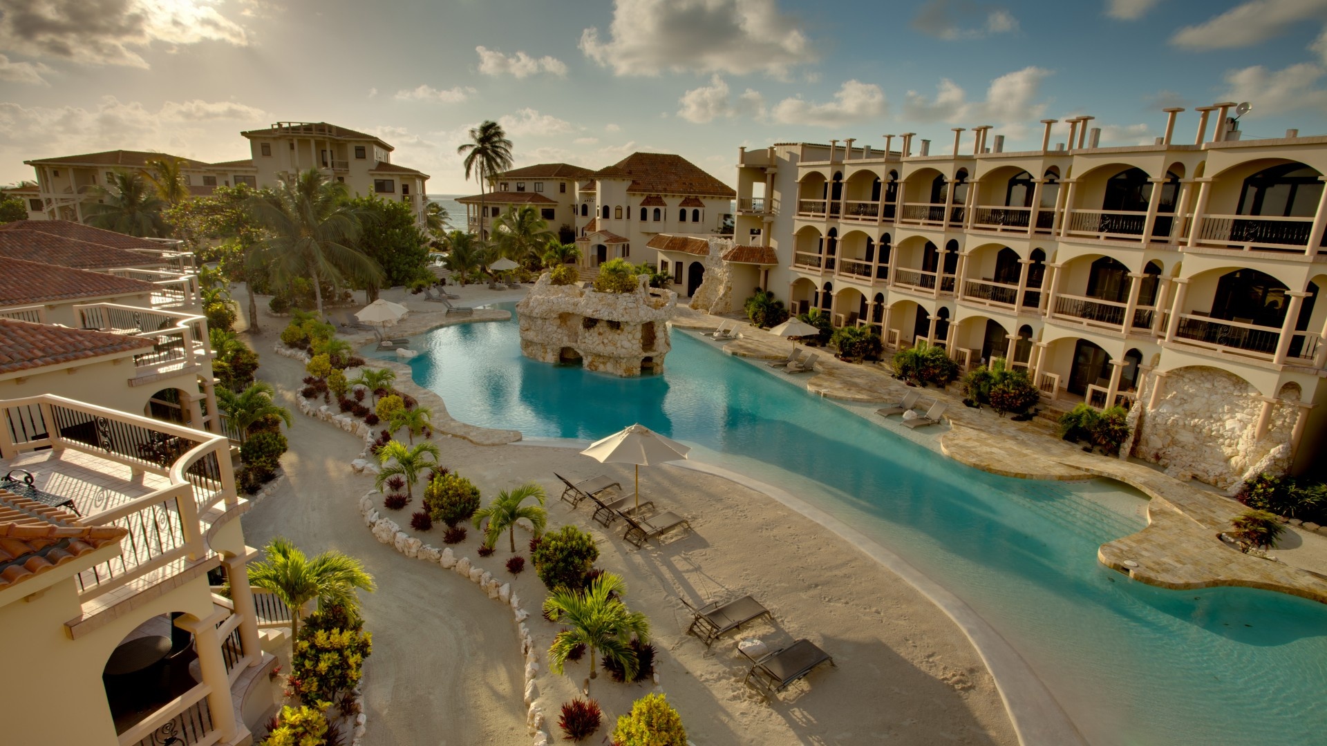 Belize resort getaway, Relax by the pool, Sun-kissed paradise, Architectural beauty, 1920x1080 Full HD Desktop