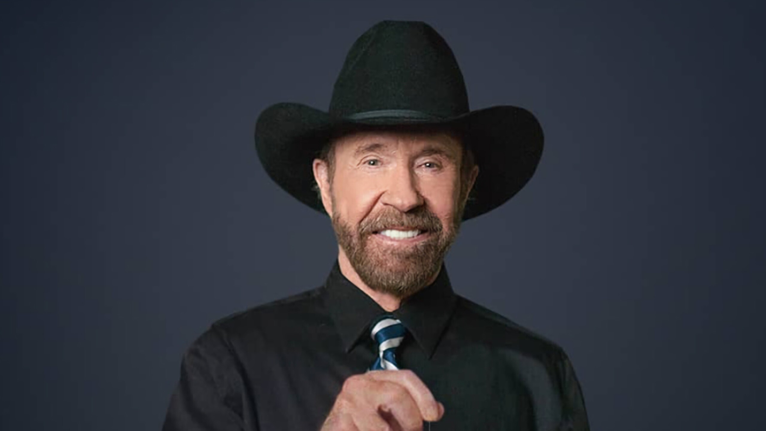 Chuck Norris, Unstoppable force, Memorable roles, Cult classic star, 2560x1440 HD Desktop