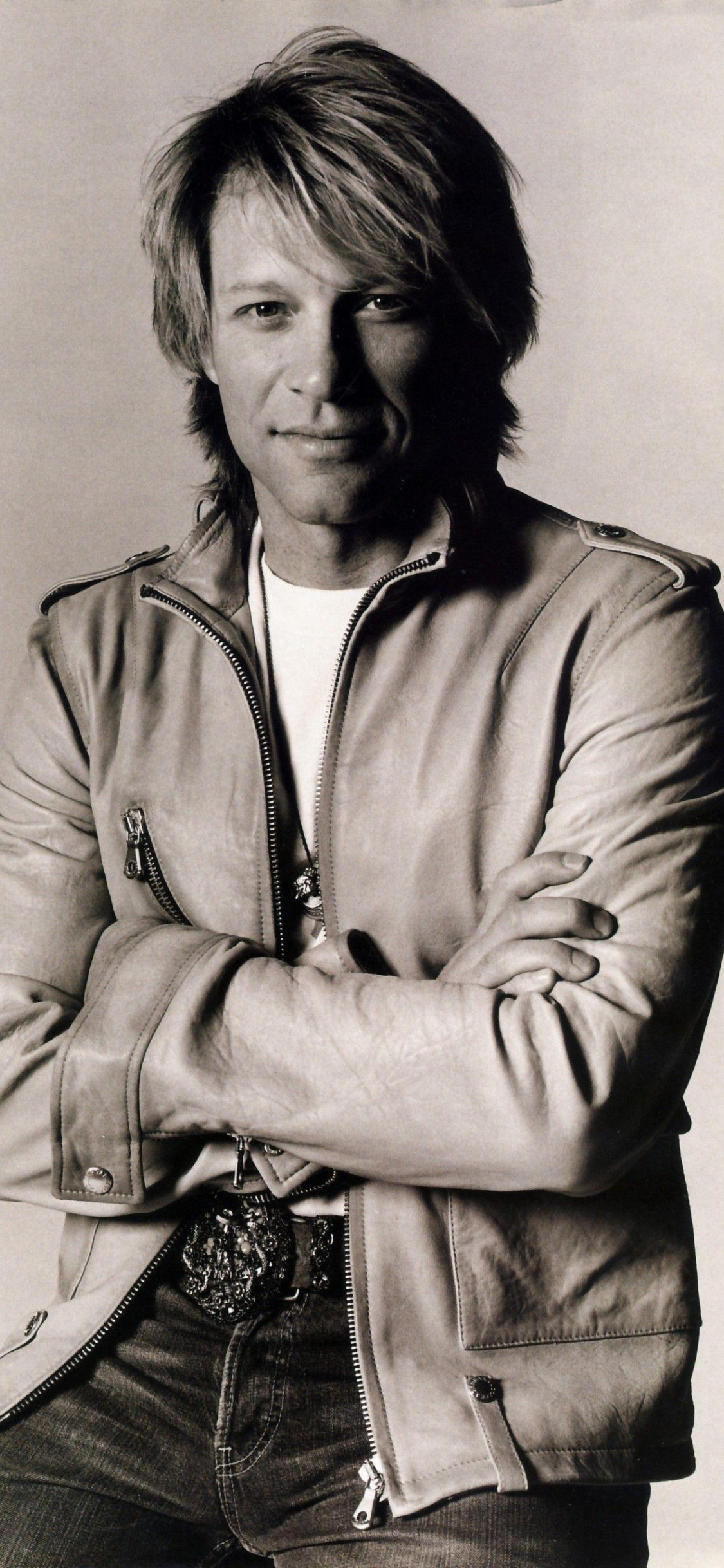 Bon Jovi, Celeb musician, Towering presence, Rockstar aura, 1130x2440 HD Phone