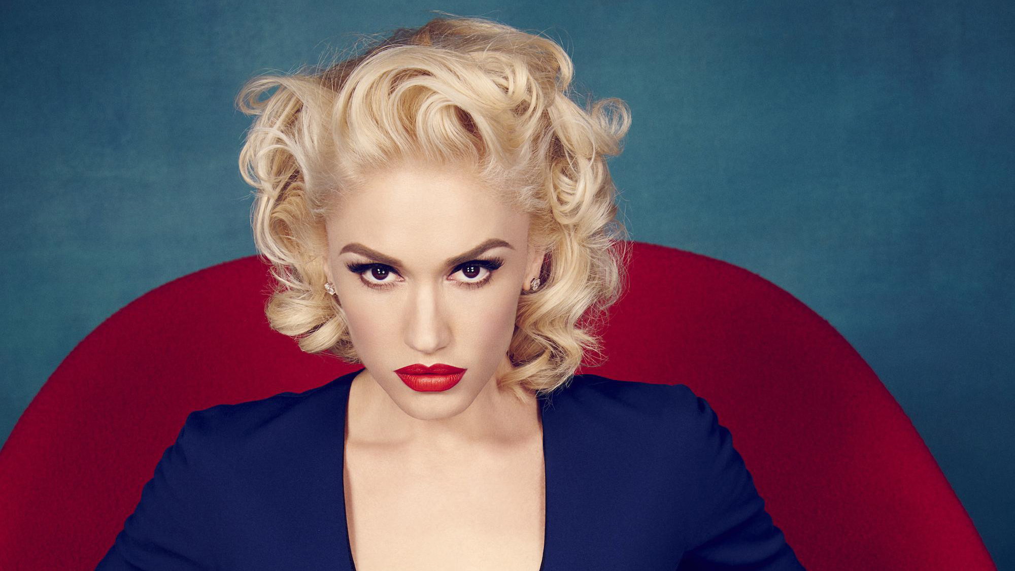 Gwen Stefani charm, Musical inspiration, Vibrant performer, Empowering icon, 2000x1130 HD Desktop