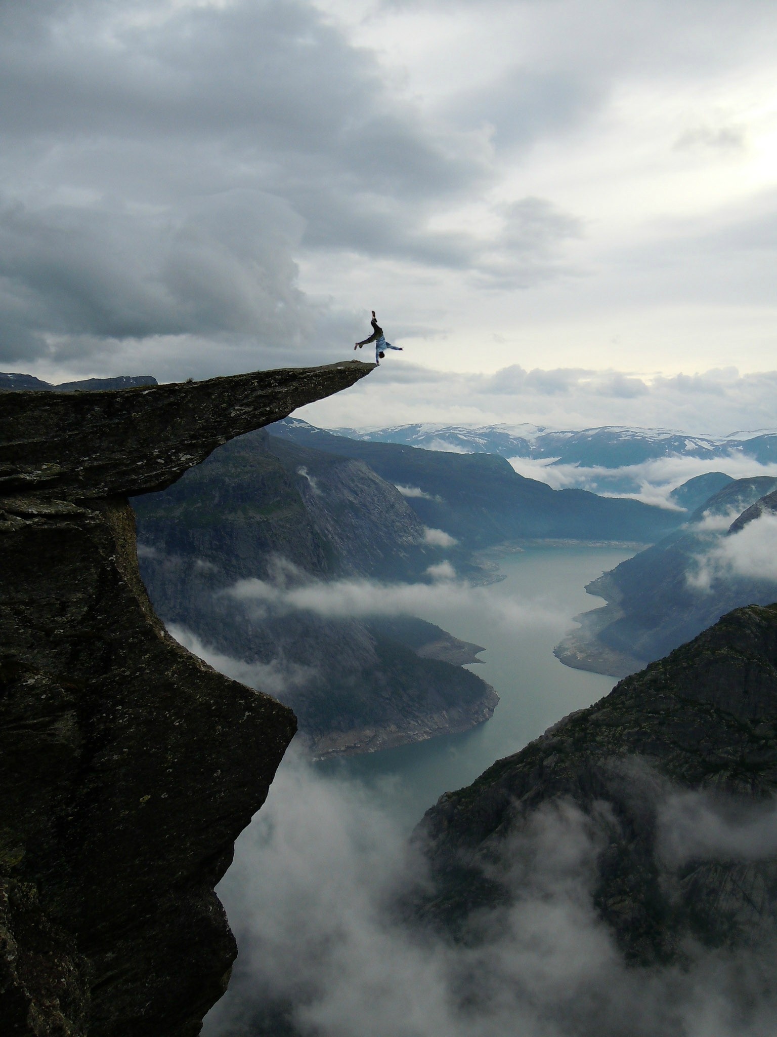 Adrenaline rush, Trolltunga stunt, Edge-kicking moment, RadAdrenalinePorn-worthy, 1540x2050 HD Phone