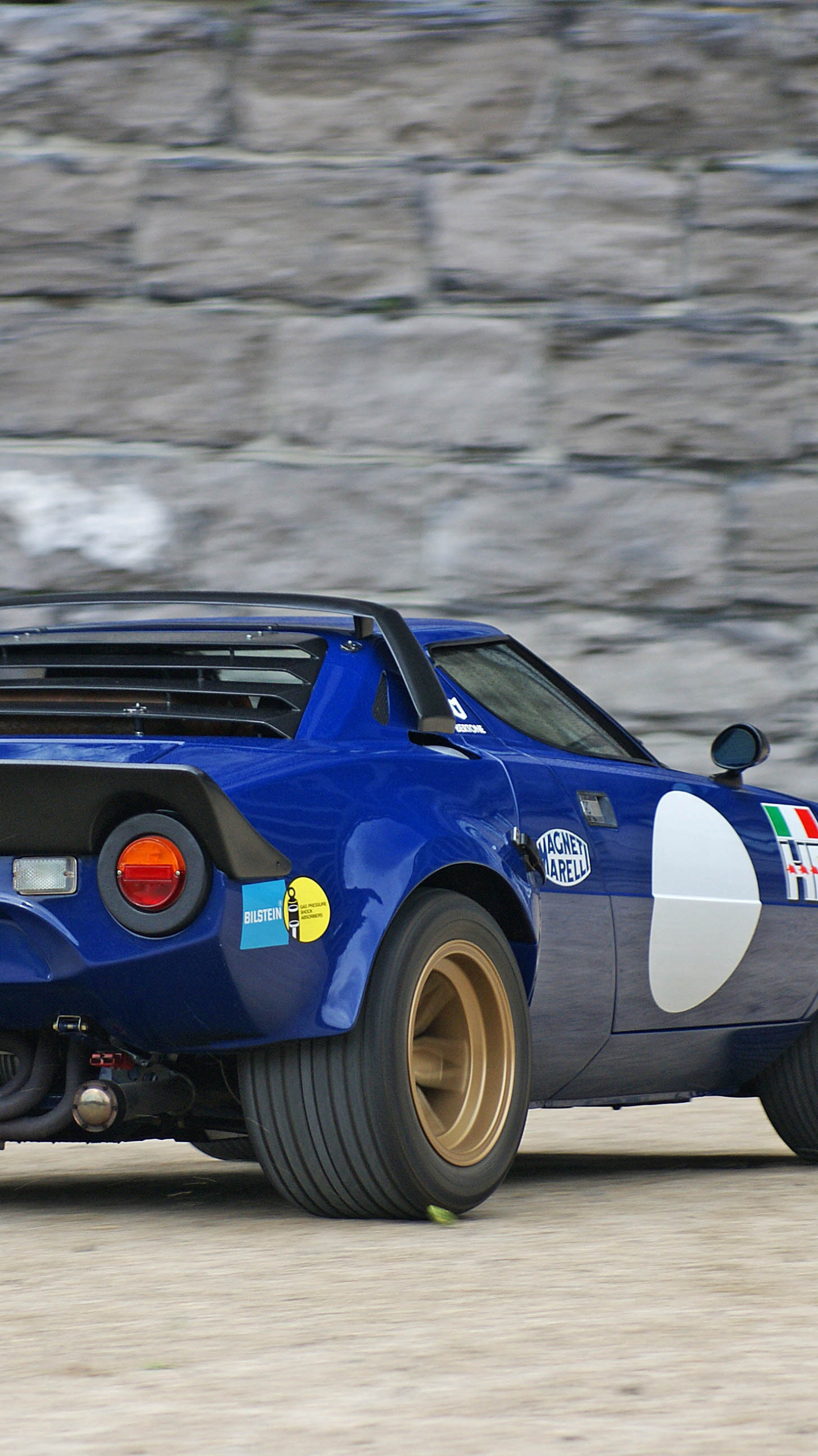 Lancia Stratos Rally, Stunning wallpaper, Captivating image, Automotive enthusiasts, 1440x2560 HD Phone