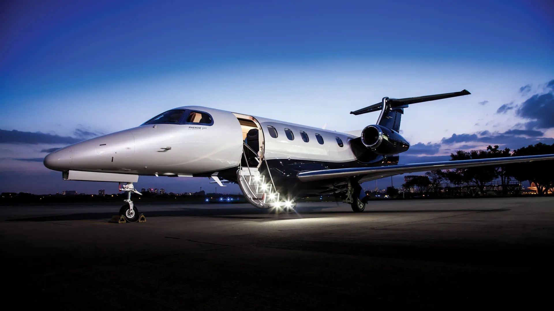 Embraer Phenom 300, Flying elegance, Ultimate lux, Jetsetting adventures, 1920x1080 Full HD Desktop