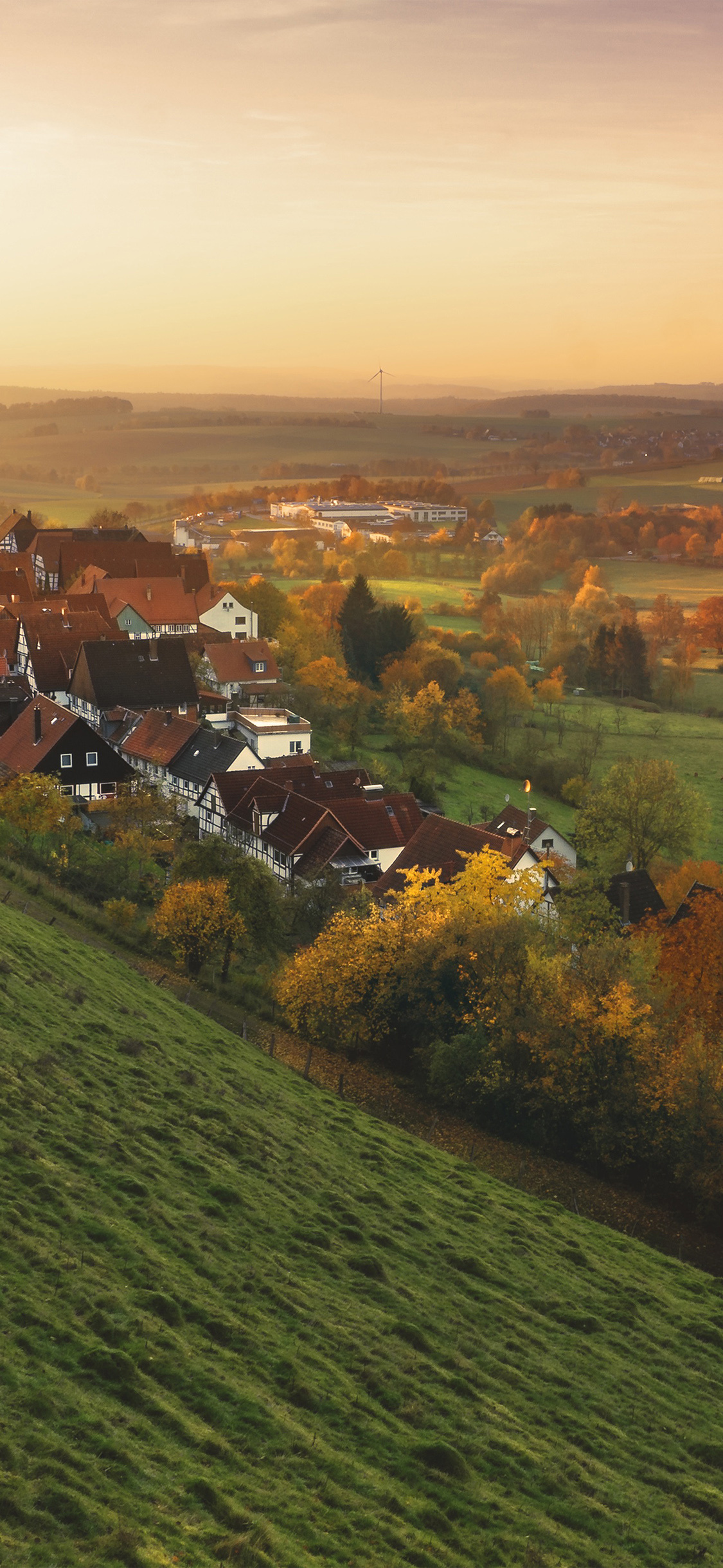 Peaceful mountain town, Fall colors, Tranquil atmosphere, Serene tree backdrop, 1130x2440 HD Phone