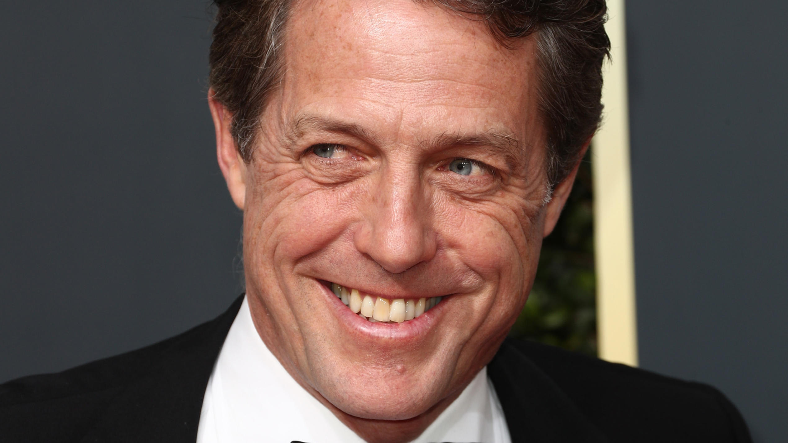 Versatile actor, Romantic comedy master, Patchwork family, Hugh Grant's life, 2540x1430 HD Desktop