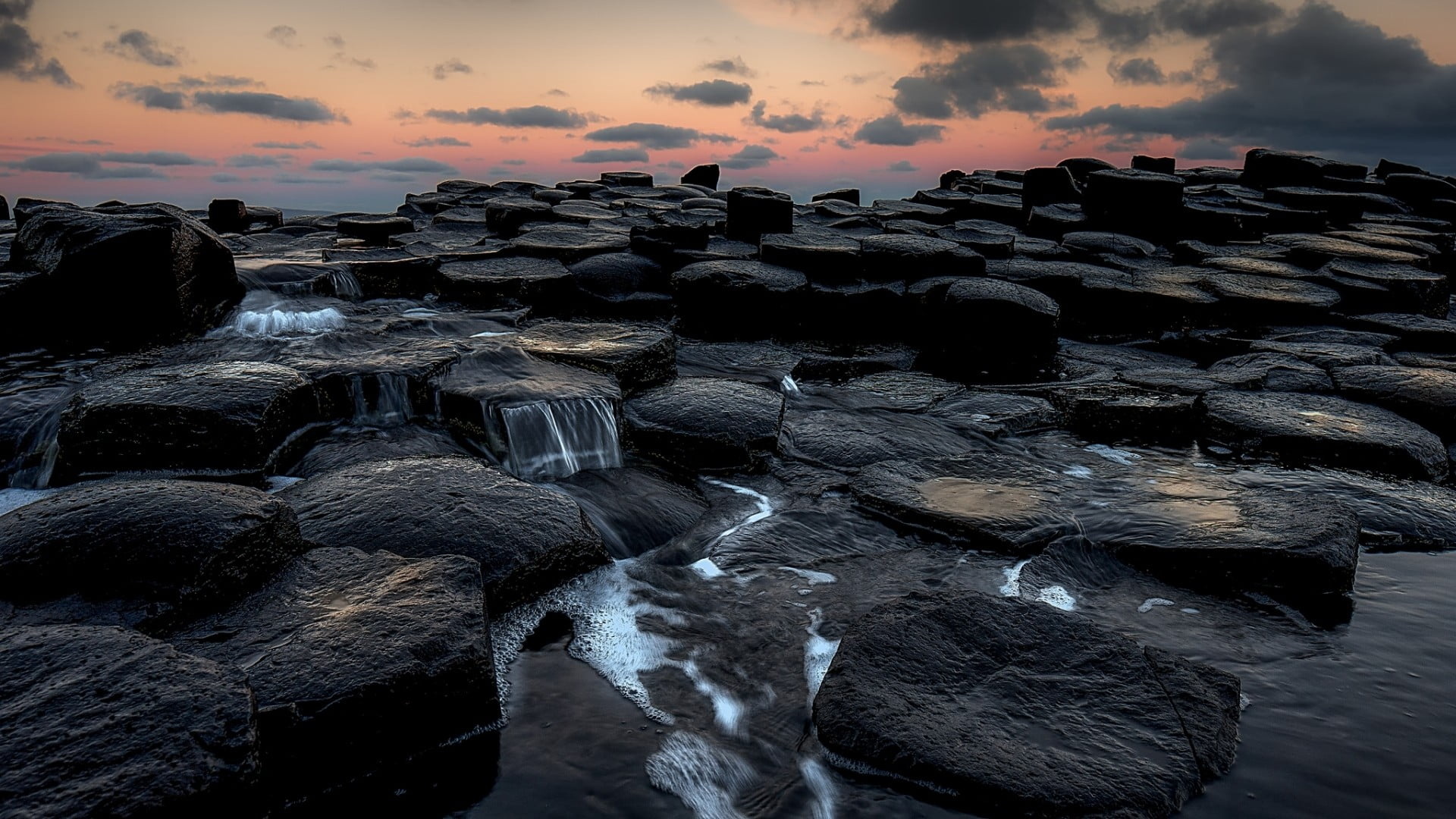 Pile of rocks near body of water with mountain view, northern ireland HD wallpaper 1920x1080