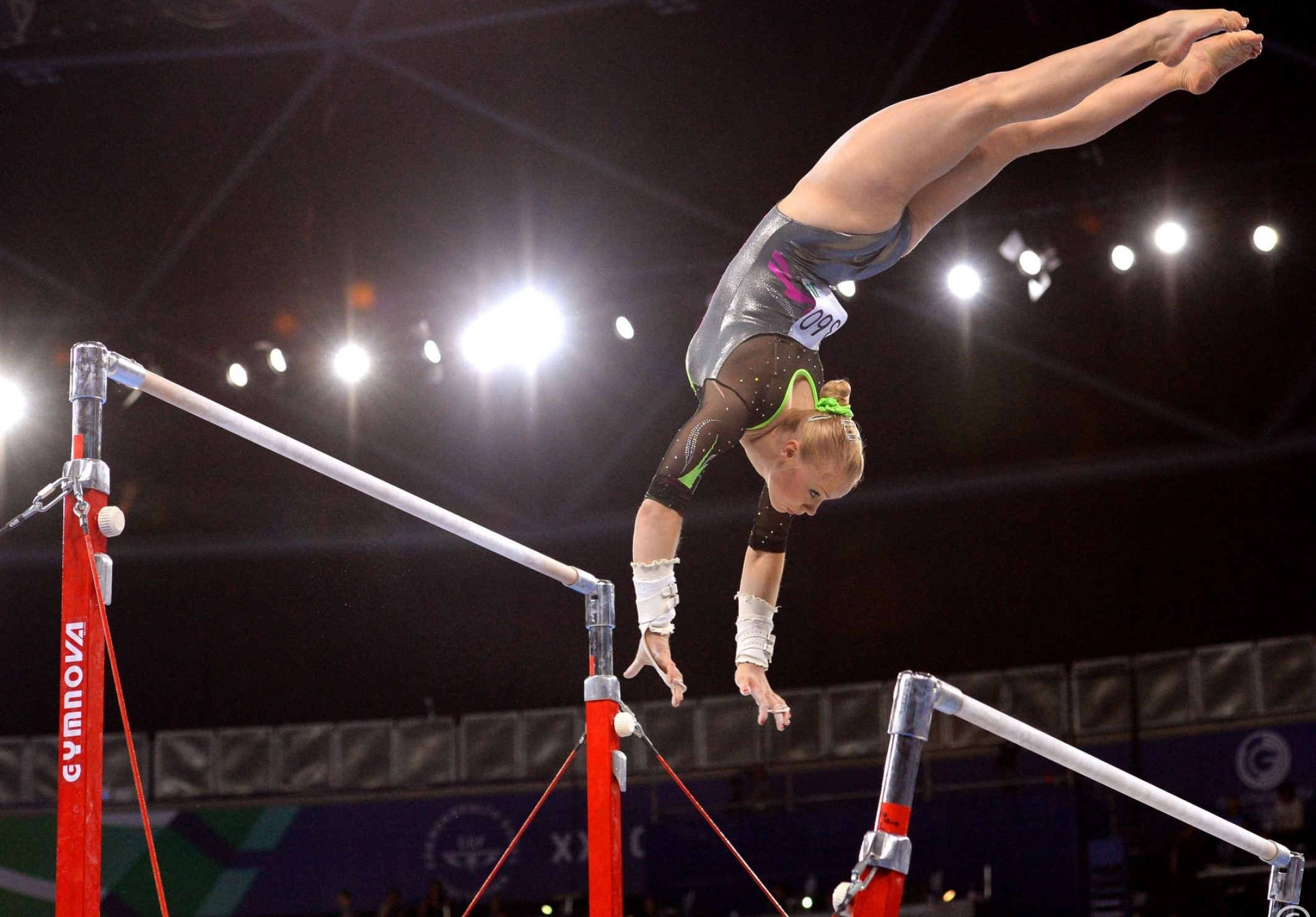 Uneven bars promotions, Gymnastics apparatus, Graceful routine, Athletic excellence, 2130x1480 HD Desktop