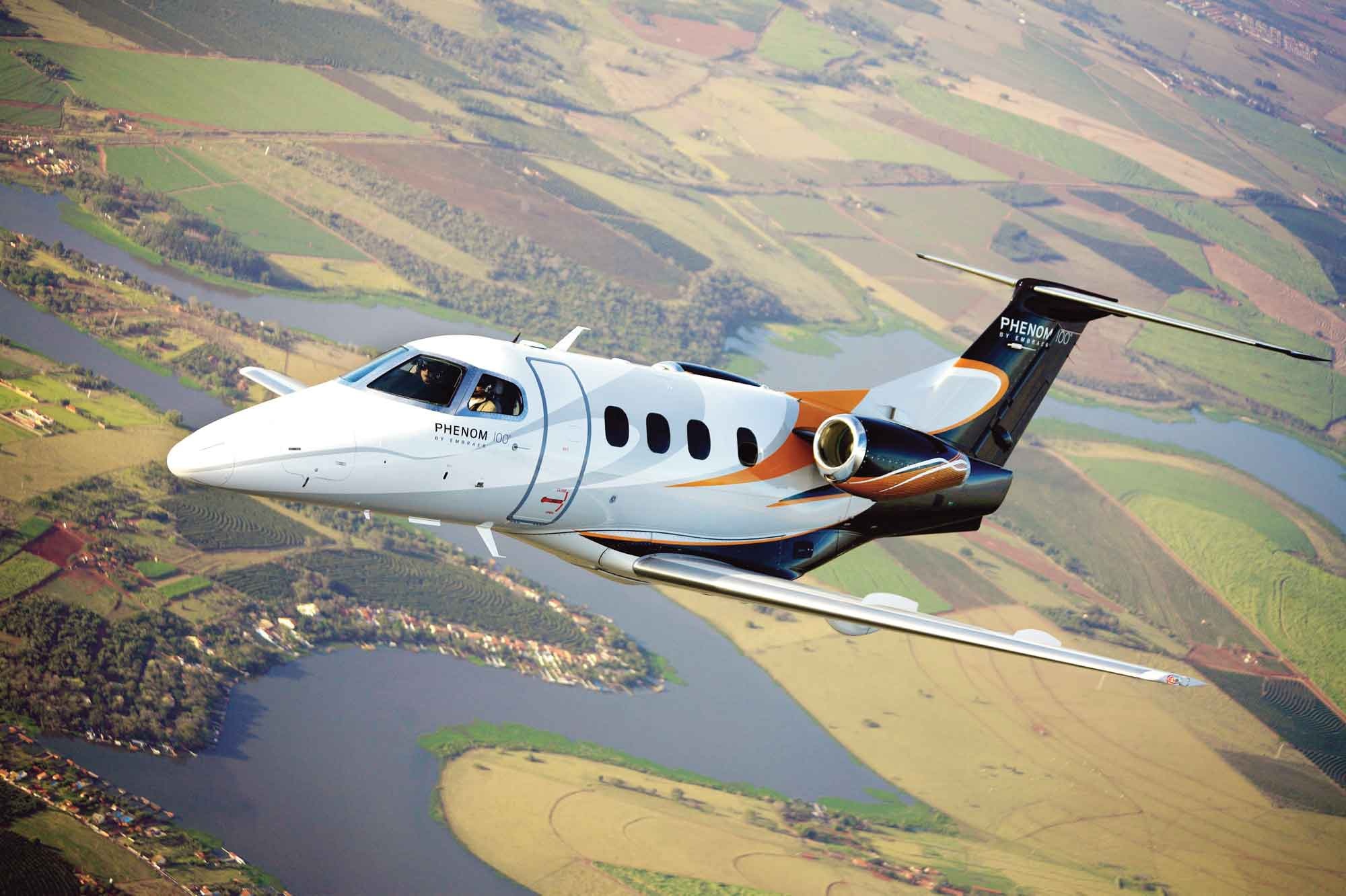 Embraer Phenom, Business jet traveler, Luxury air travel, Unmatched comfort, 2000x1340 HD Desktop