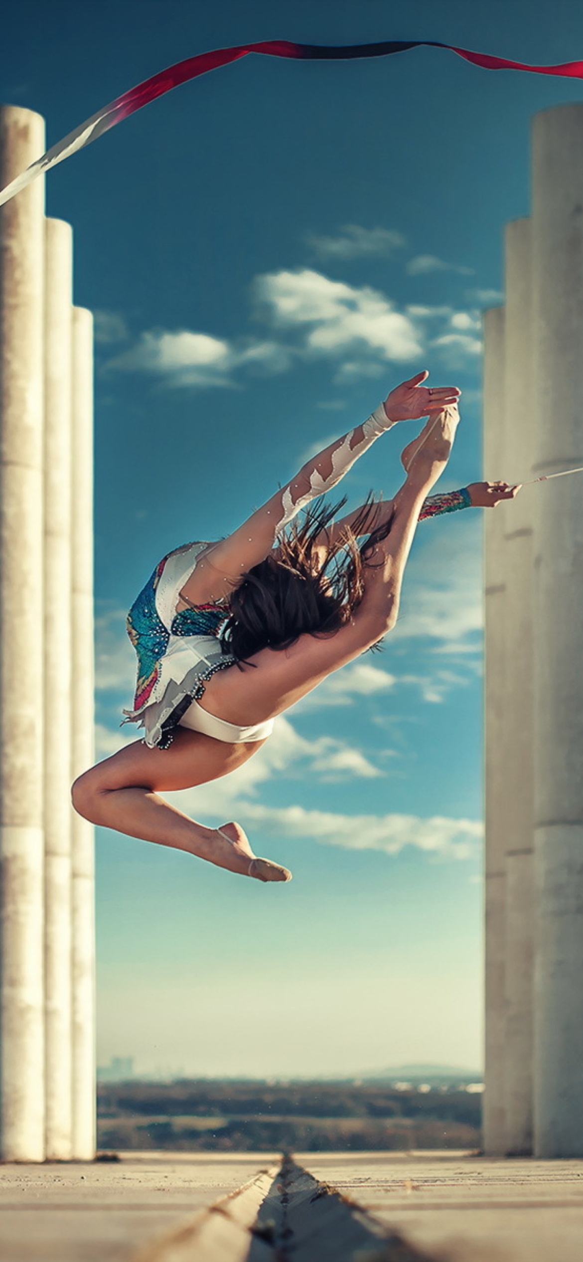 Jumping gymnast in focus, iPhone 11 wallpaper, Captivating visuals, Dynamic display, 1170x2540 HD Phone