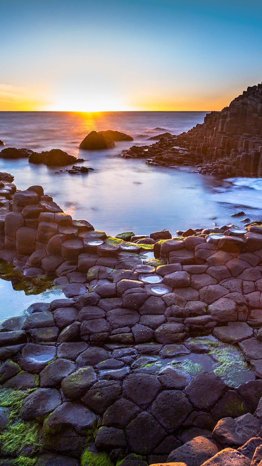 Northern Ireland, Sun setting over Giants Causeway, 1080x1920 Full HD Phone