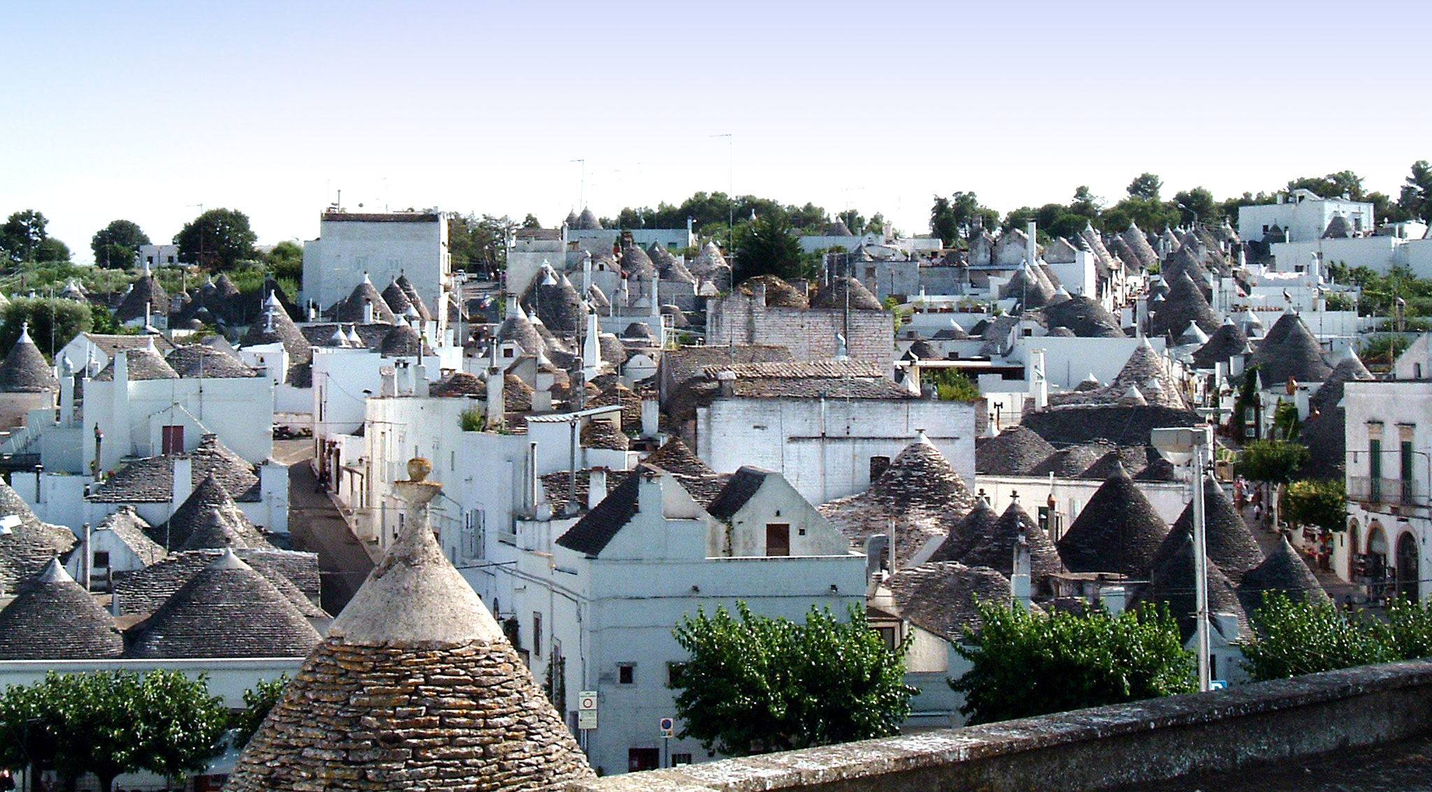 Picturesque Alberobello, Cultural landmarks, Stunning architecture, 2050x1140 HD Desktop