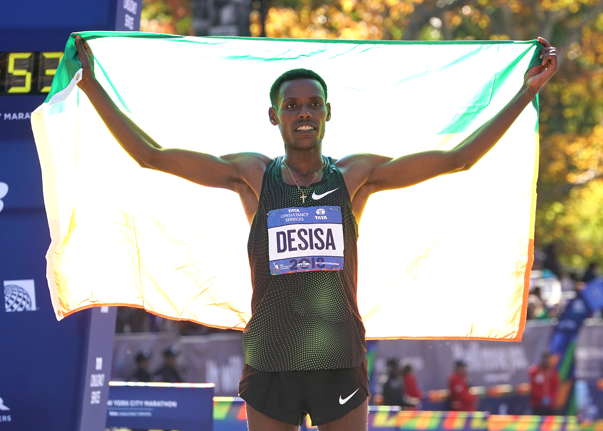 Lelisa Desisa, NYC Marathon victory, Impressive endurance, Marathon gold medal, 2000x1440 HD Desktop