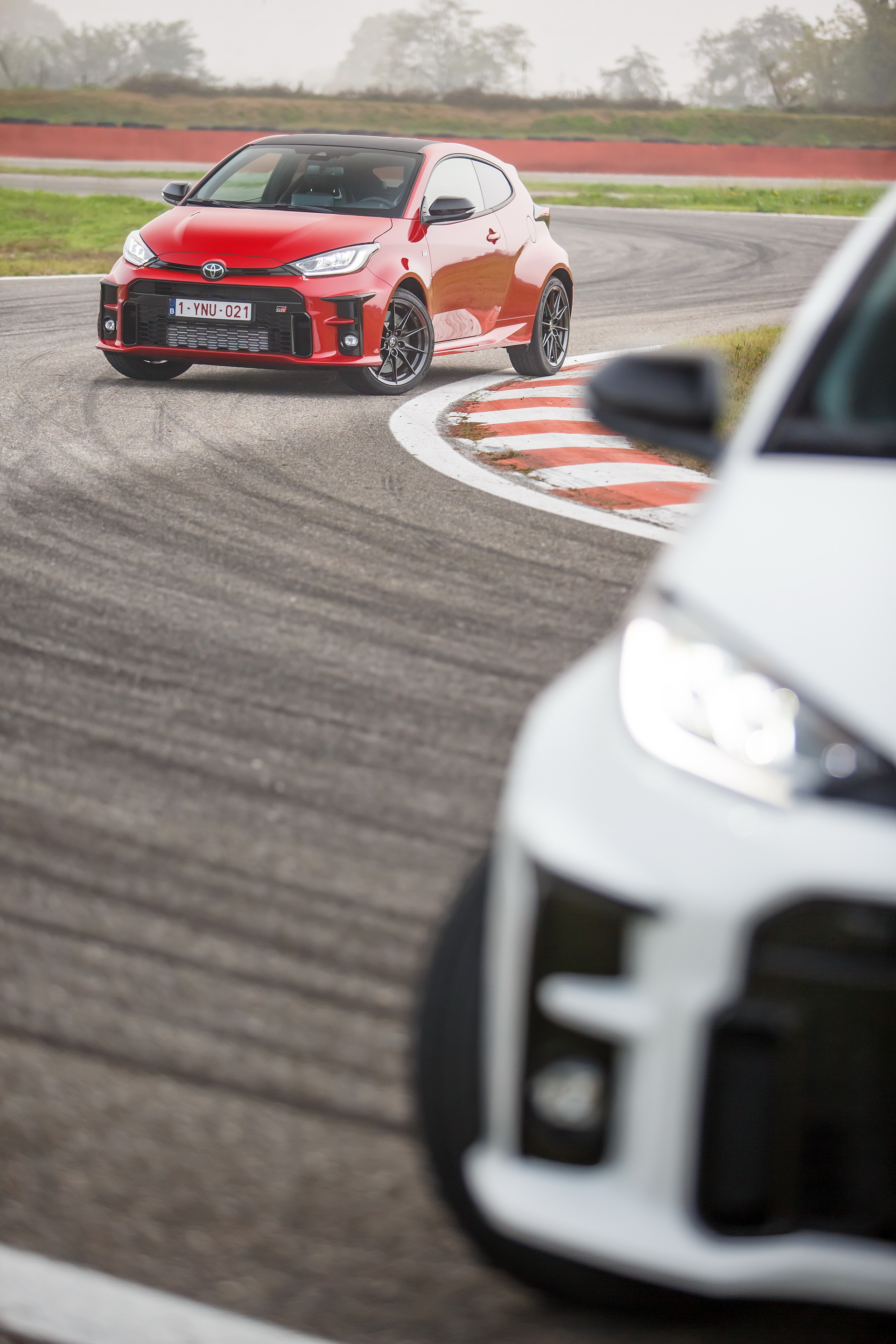 Race track, Toyota Yaris Wallpaper, 1920x2880 HD Phone