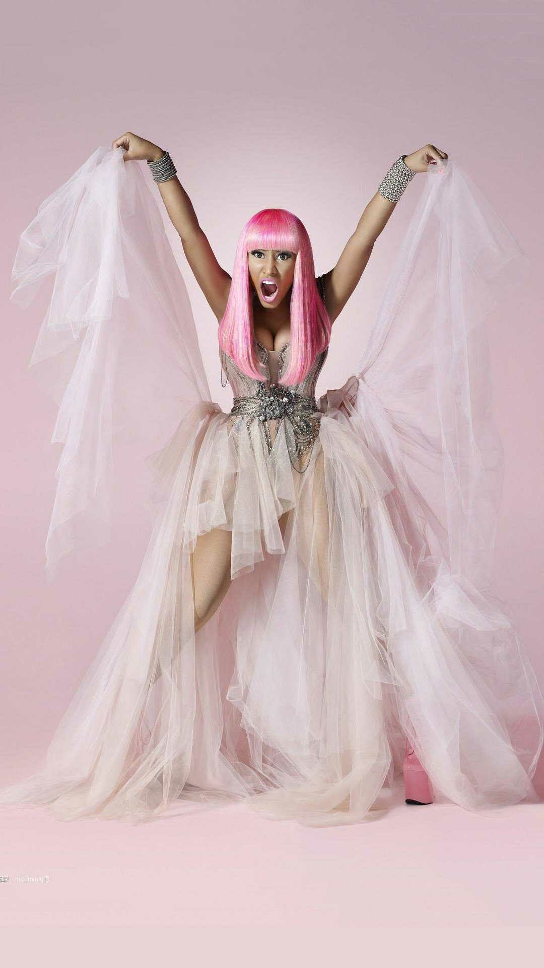 Nicki Minaj, Vibrant personality, Striking wallpaper, Captivating image, 1080x1920 Full HD Phone