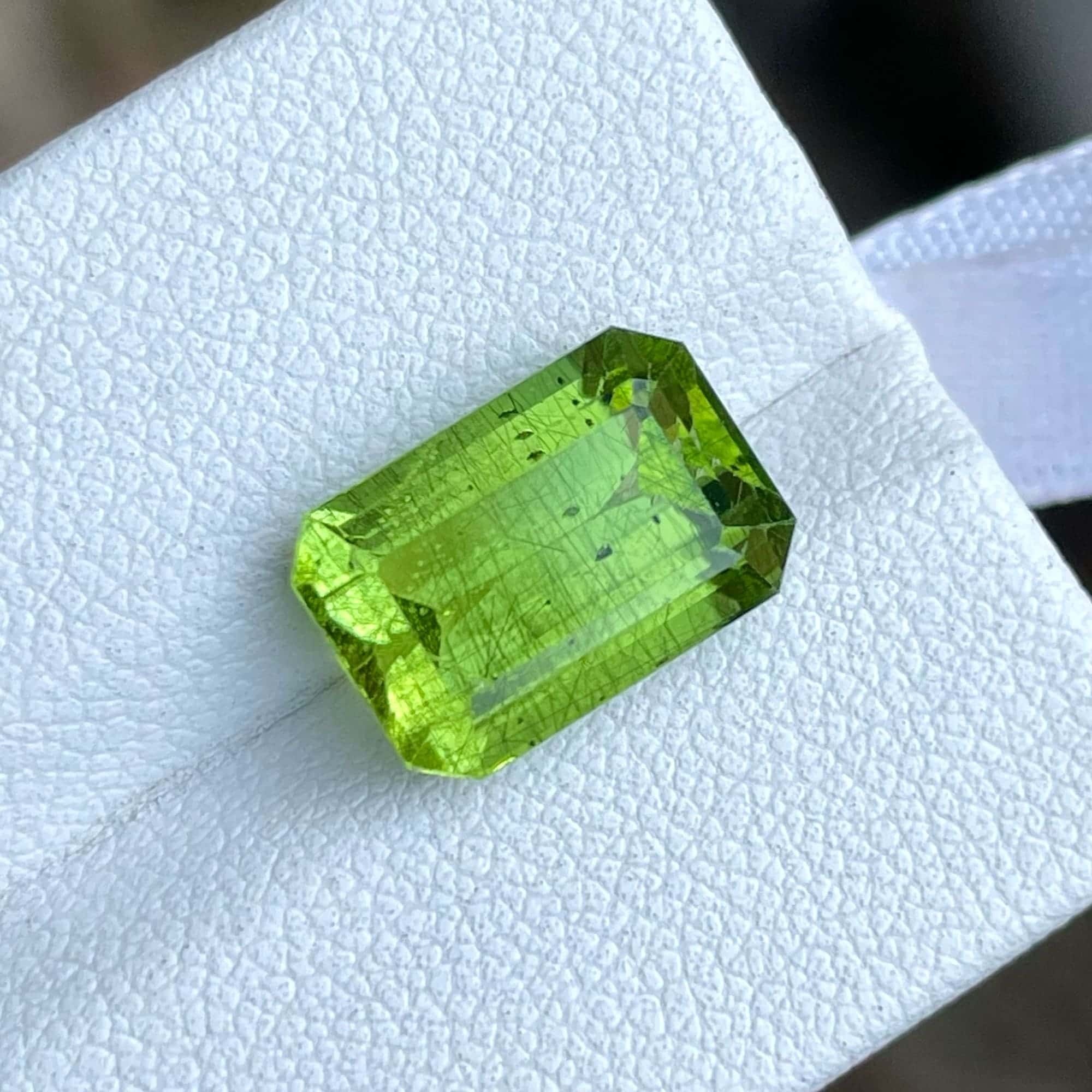 Peridot, Faceted rutile gemstone, Ethereal beauty, Rare gem, 2000x2000 HD Phone