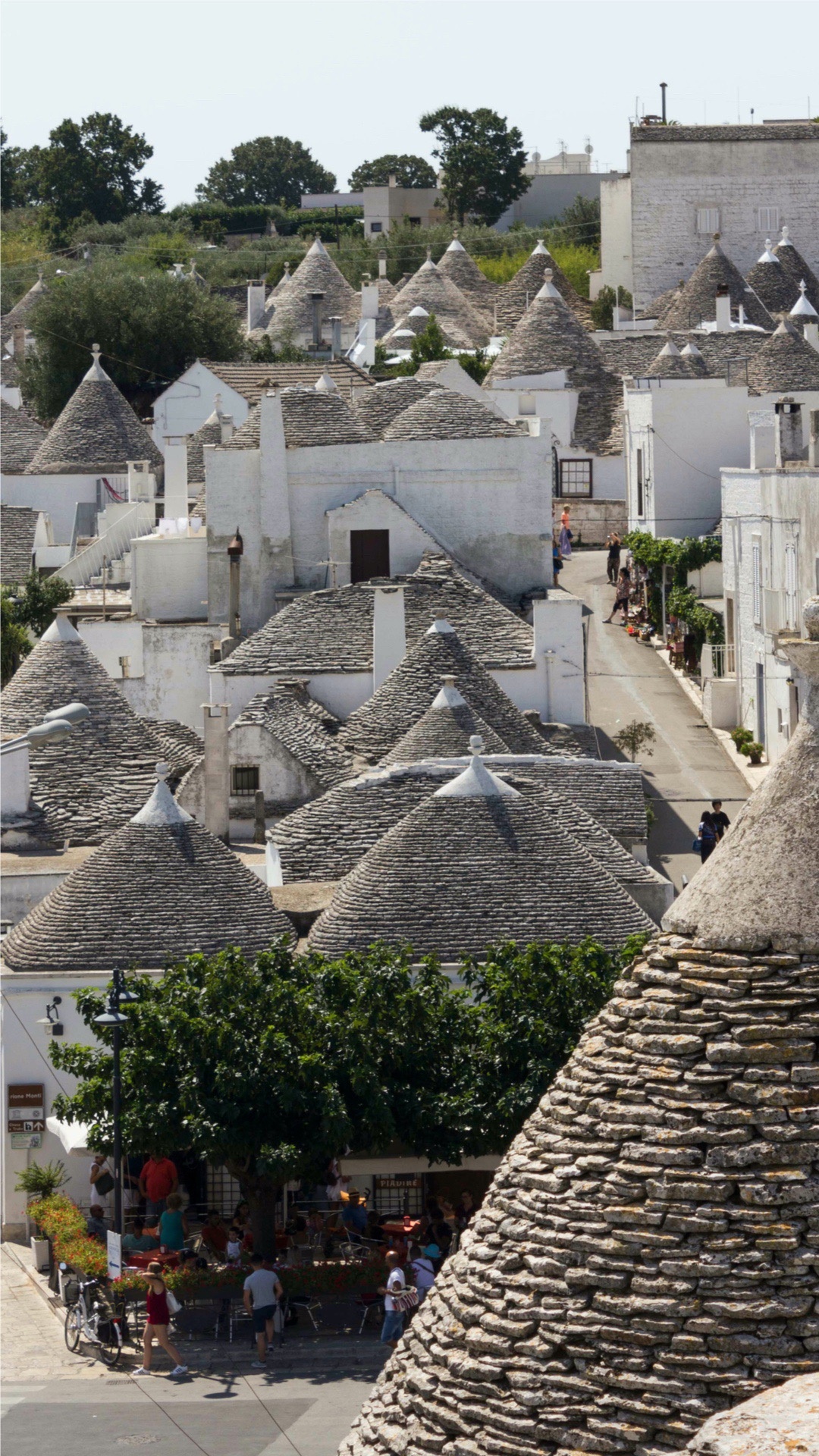 Exploring trulli houses, Alberobello's magical allure, 1080x1920 Full HD Phone