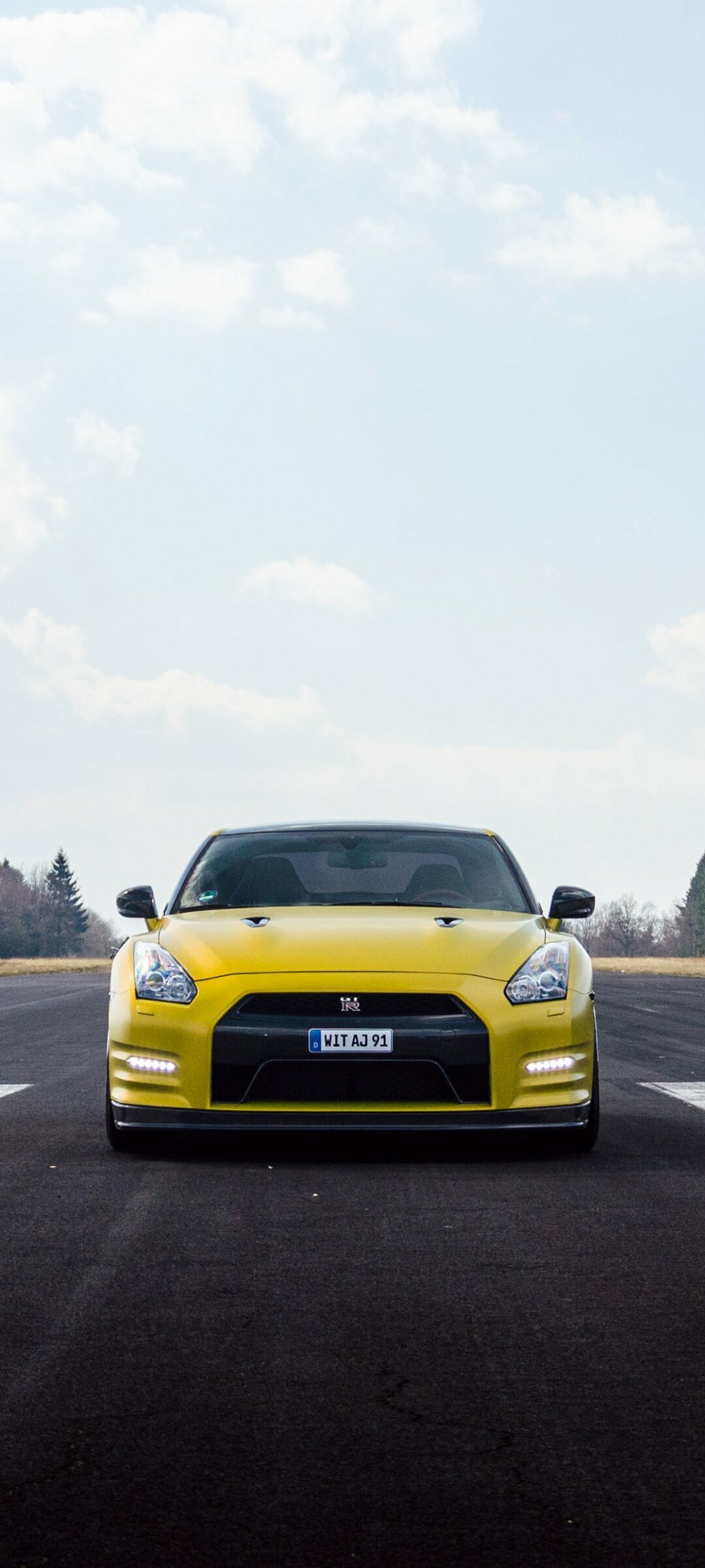 Nissan GT-R, Automotive masterpiece, Unparalleled engineering, Pure adrenaline, 1080x2400 HD Phone