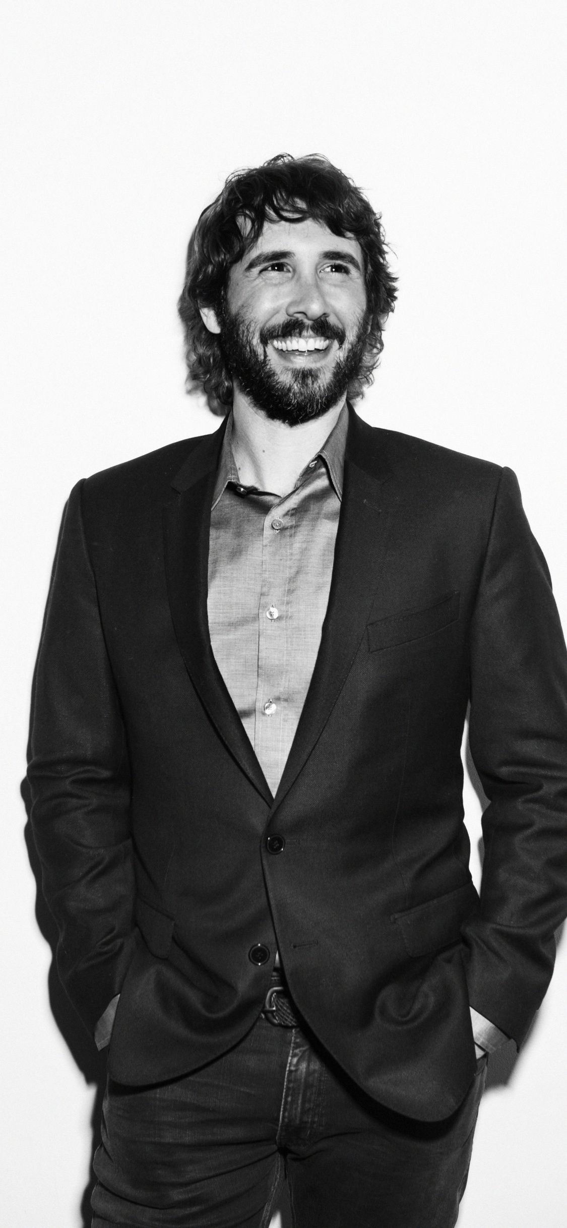 Josh Groban, Smiling face, Monochrome mood, Celebrity wallpaper, 1130x2440 HD Phone