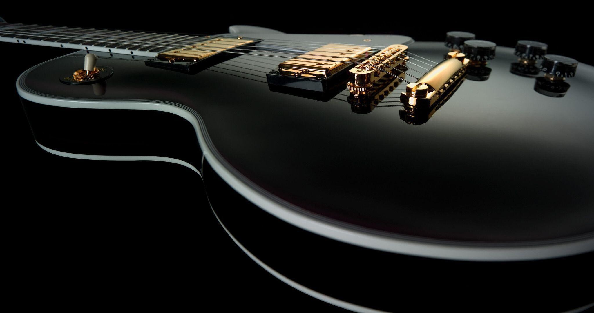 Gibson Guitar, Iconic instrument, Les Paul legacy, Rock 'n' roll vibes, 2050x1080 HD Desktop