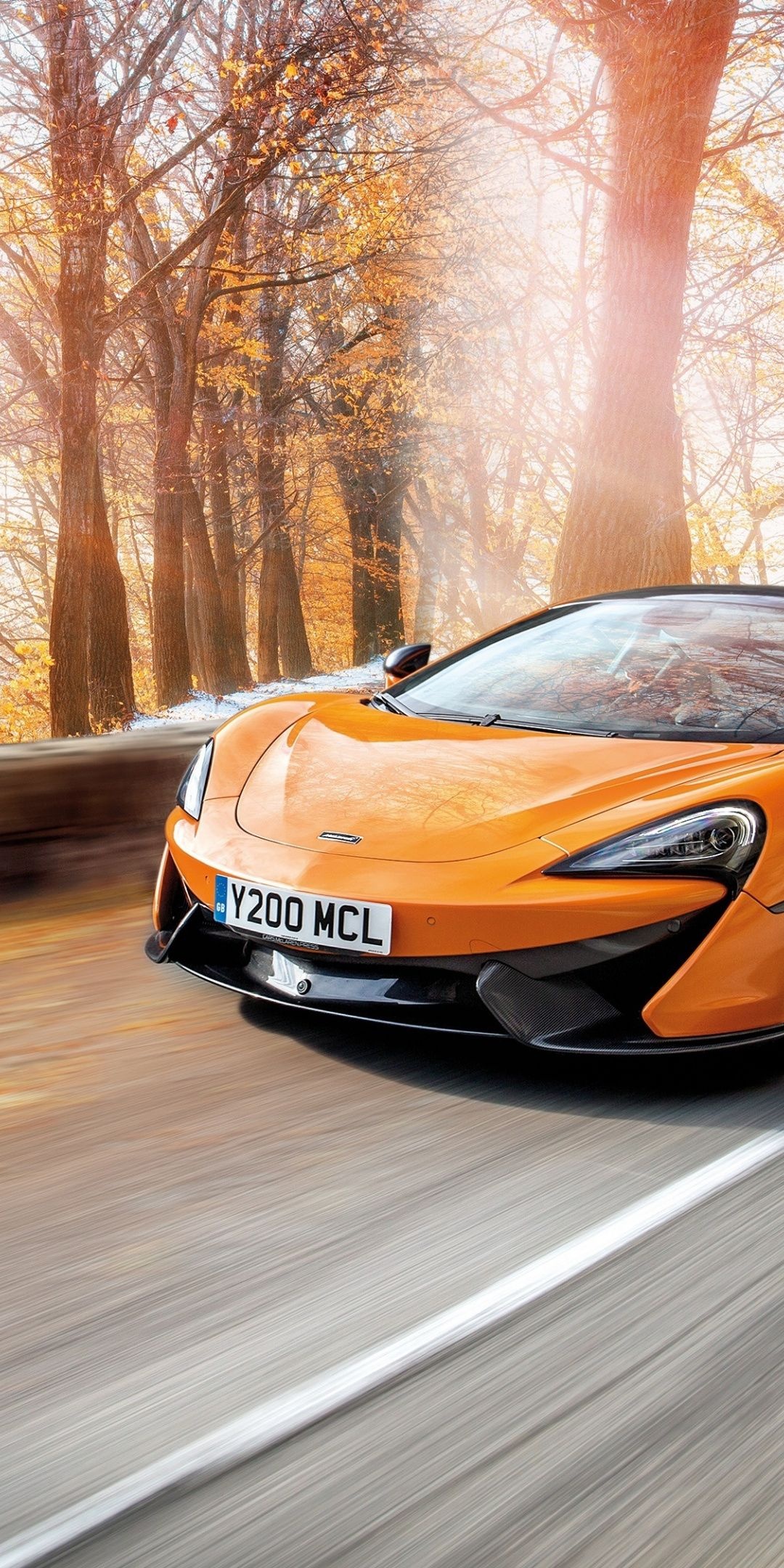 McLaren 570S, Orange sports car, Road warrior, Speed demon, 1080x2160 HD Phone