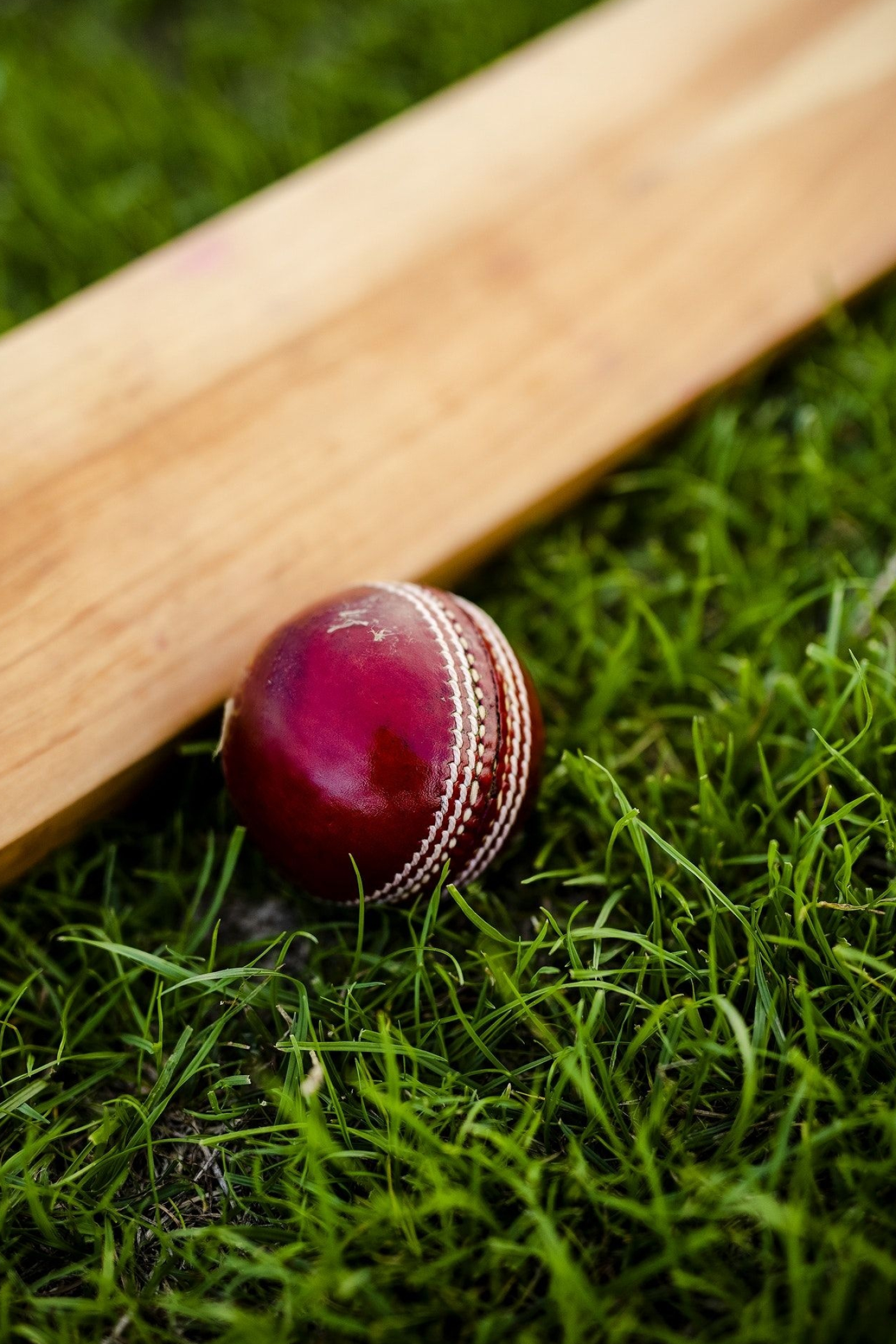 Cricket ball focus, Detailed close-up, Sports equipment, Cricket essentials, 1400x2100 HD Phone