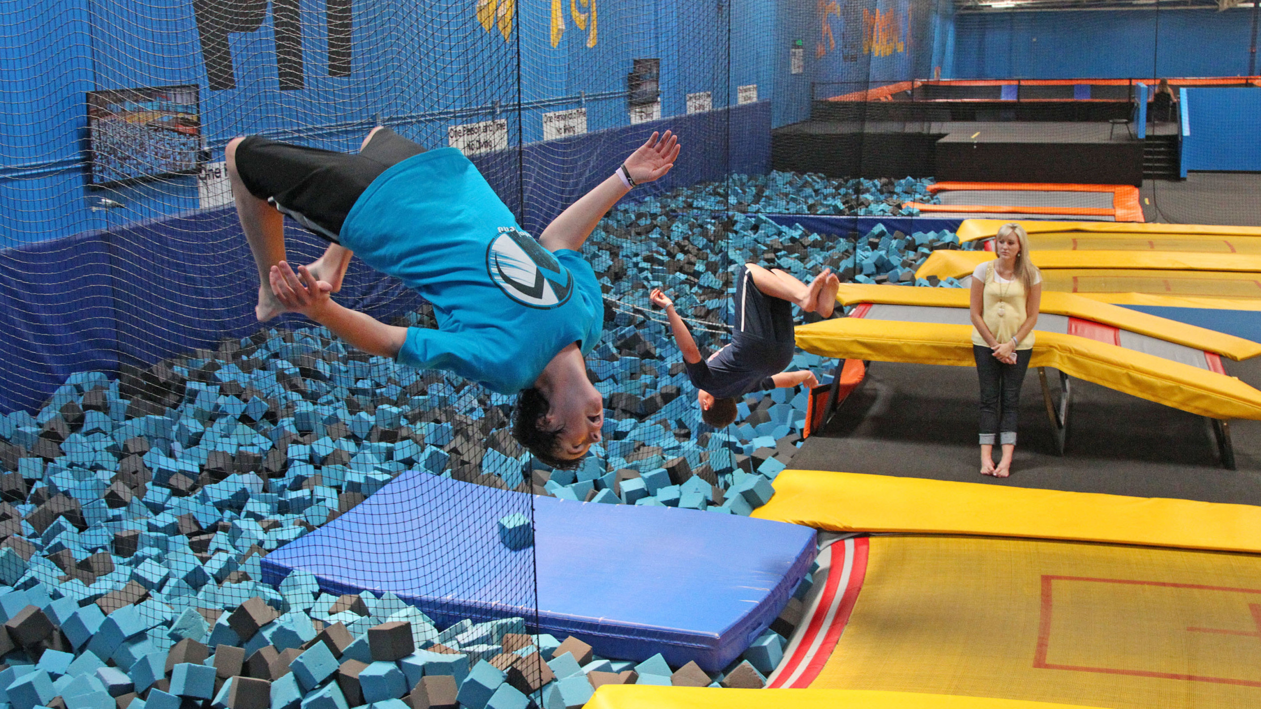 Trampoline parks, Adrenaline rush, Bouncing joy, Energetic fun, 2560x1440 HD Desktop