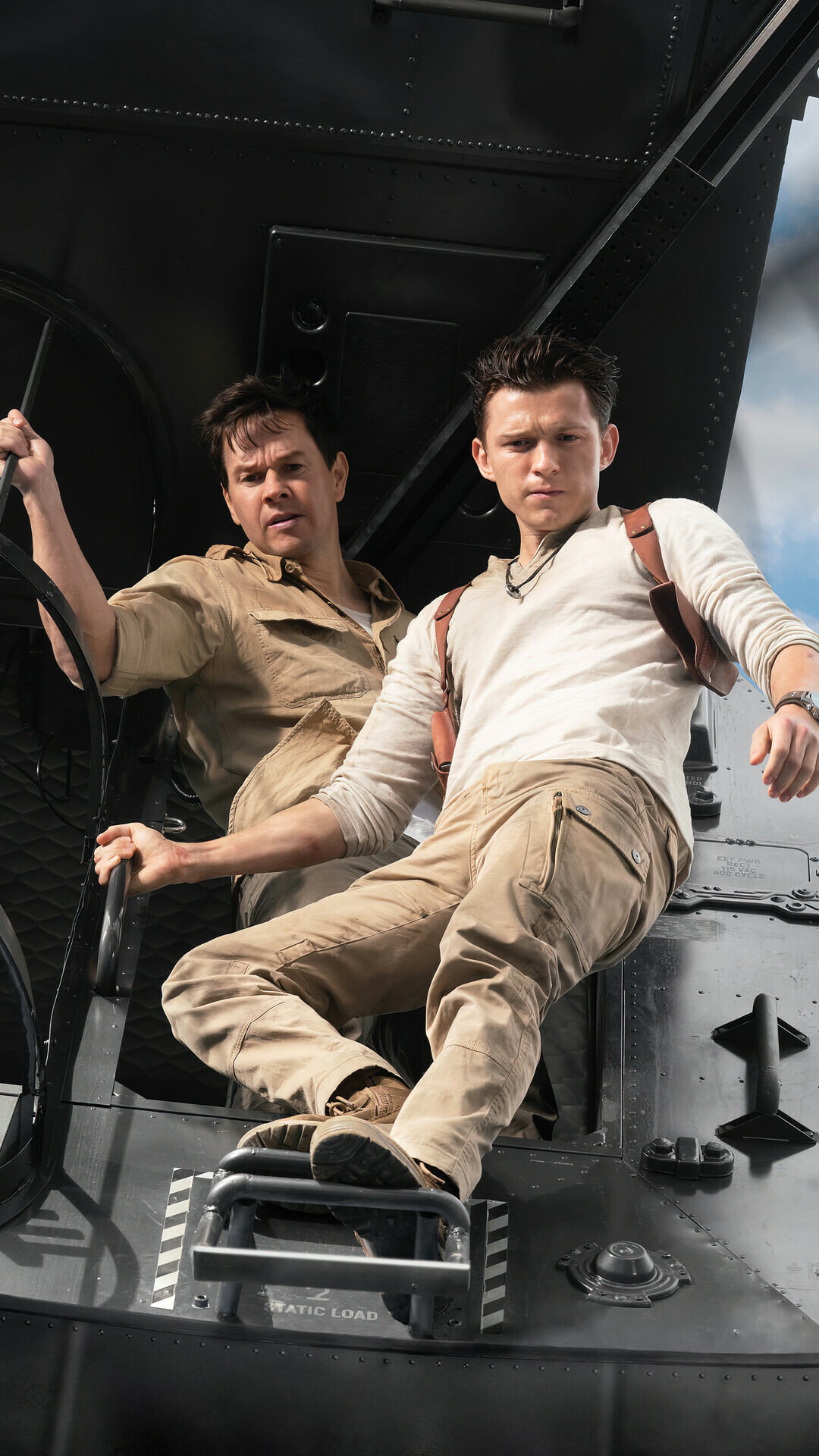 Uncharted, Tom Holland's portrayal, Mark Wahlberg's role, High-octane excitement, 1080x1920 Full HD Phone