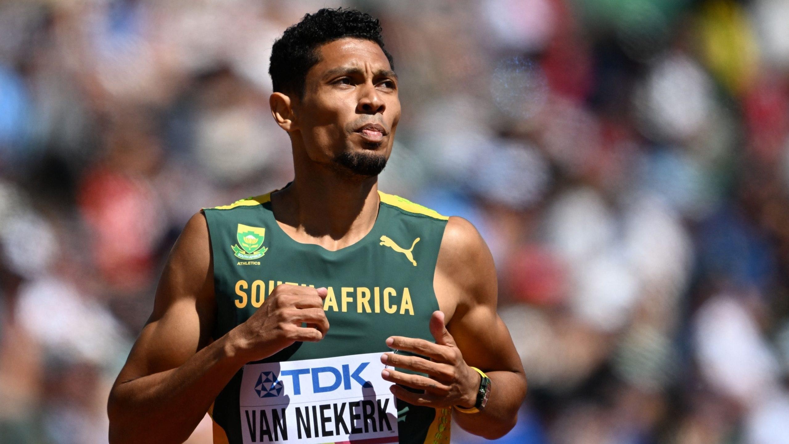 Wayde van Niekerk, Record-setting athlete, Inspiring achievements, Global recognition, 2560x1440 HD Desktop