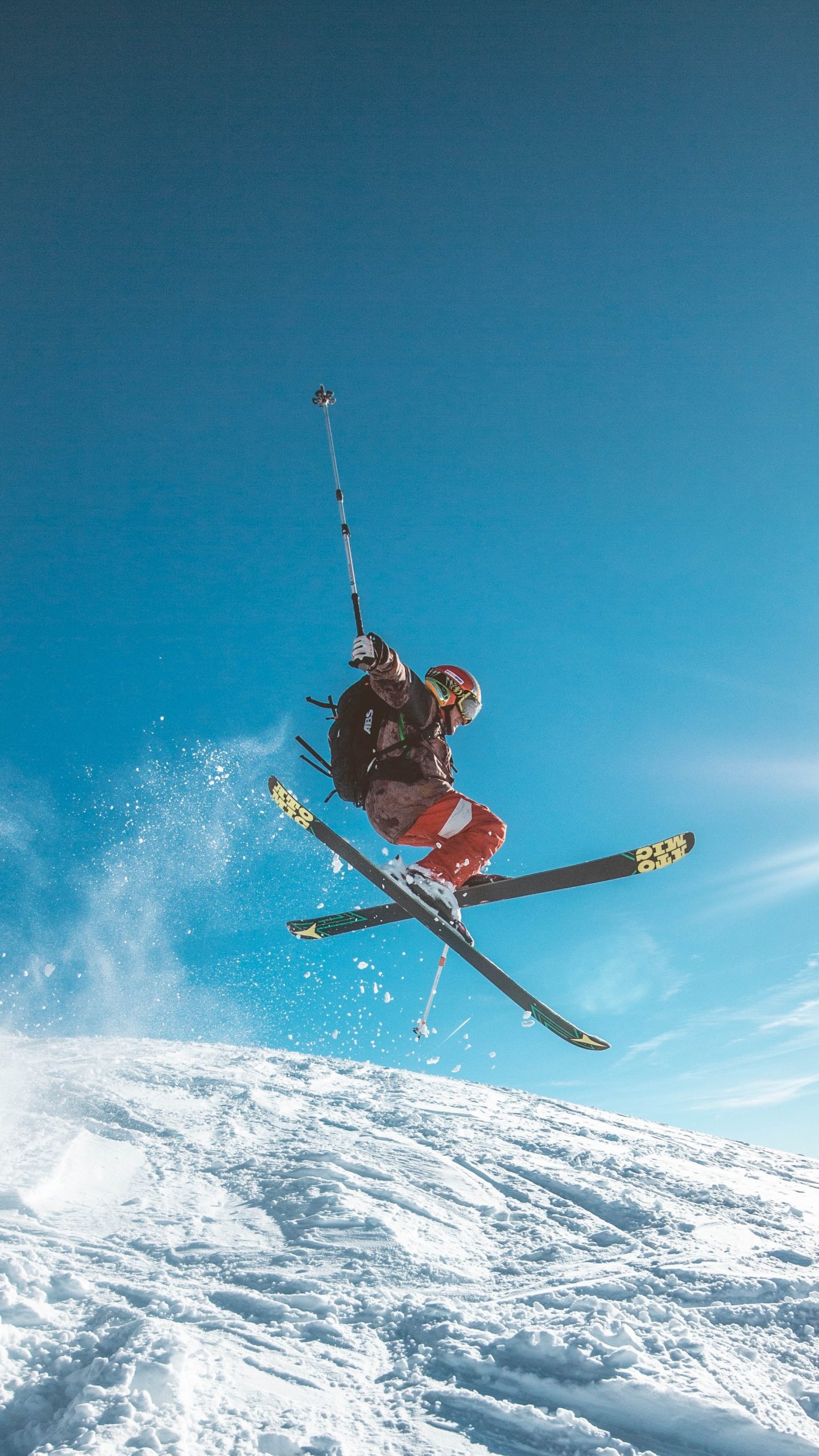 Man skiing on land, Unique perspective, Unconventional skiing, Thrill seeker, 1440x2560 HD Phone