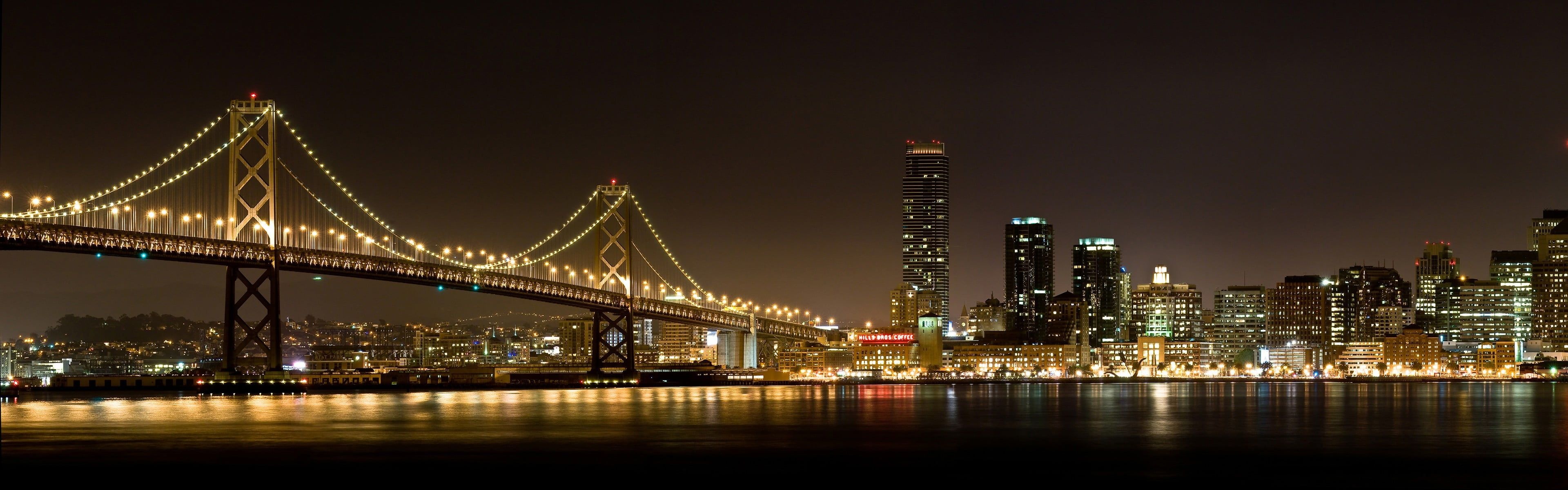 Brooklyn Bridge city lights, Nighttime reflection, 3840x1200 Dual Screen Desktop