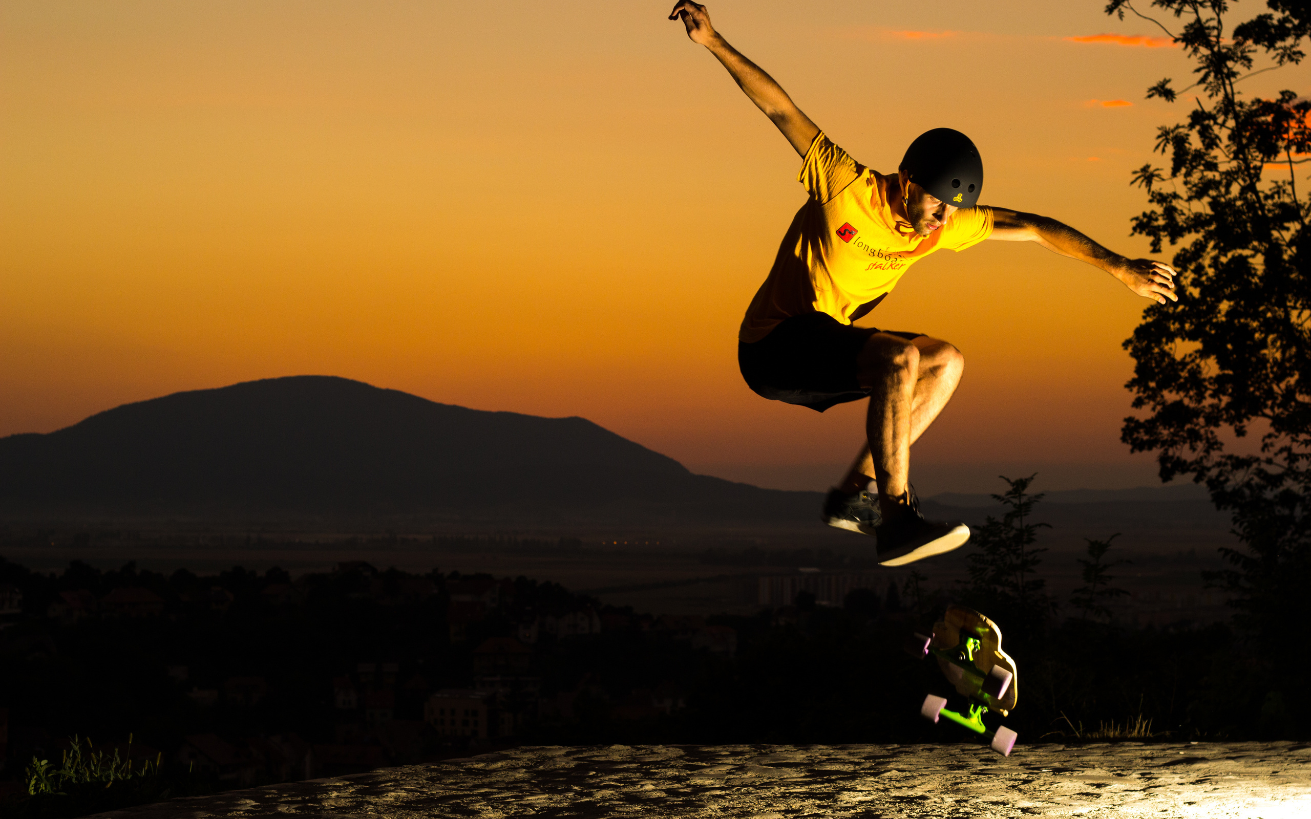 Jumping high, Sunset silhouette, Helmet protection, Skater in the air, 2560x1600 HD Desktop