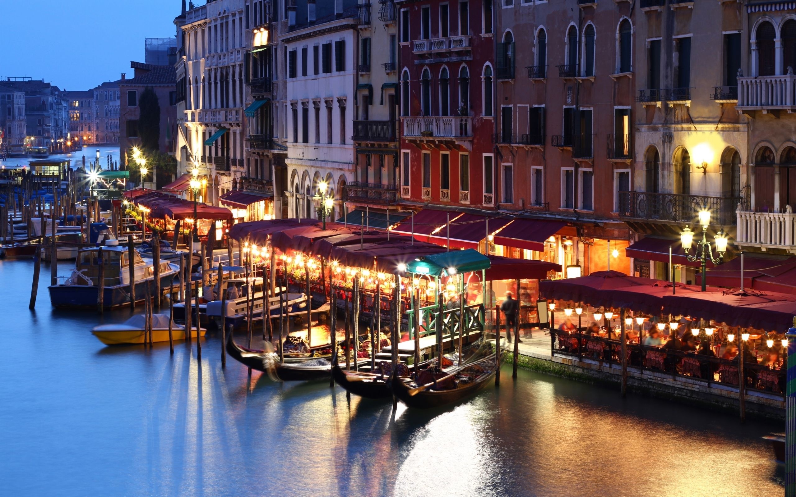 Venice, Canal flowers, Venetian architecture, Vibrant city life, 2560x1600 HD Desktop