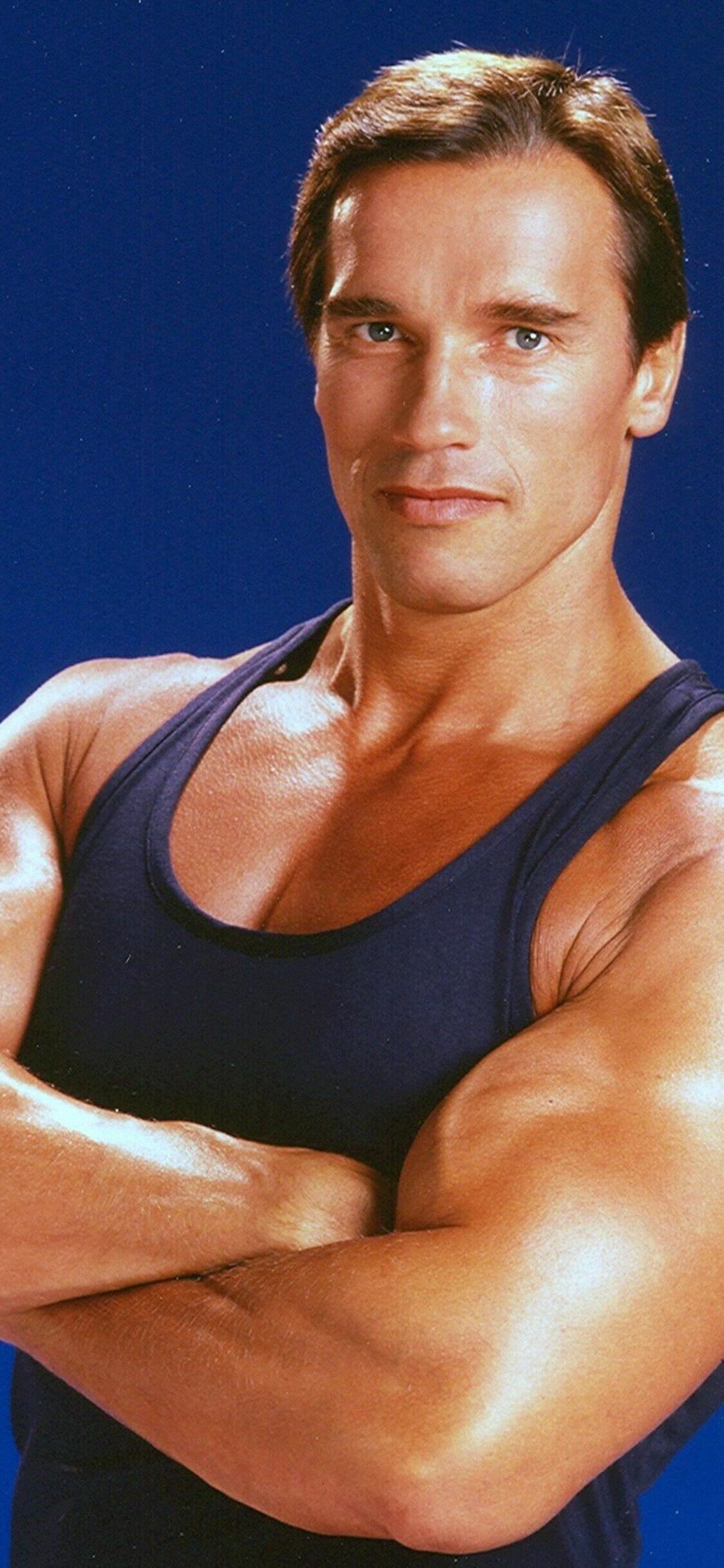 Arnold Schwarzenegger, iPhone XS wallpaper, HD 4k backgrounds, Captivating photos, 1130x2440 HD Phone