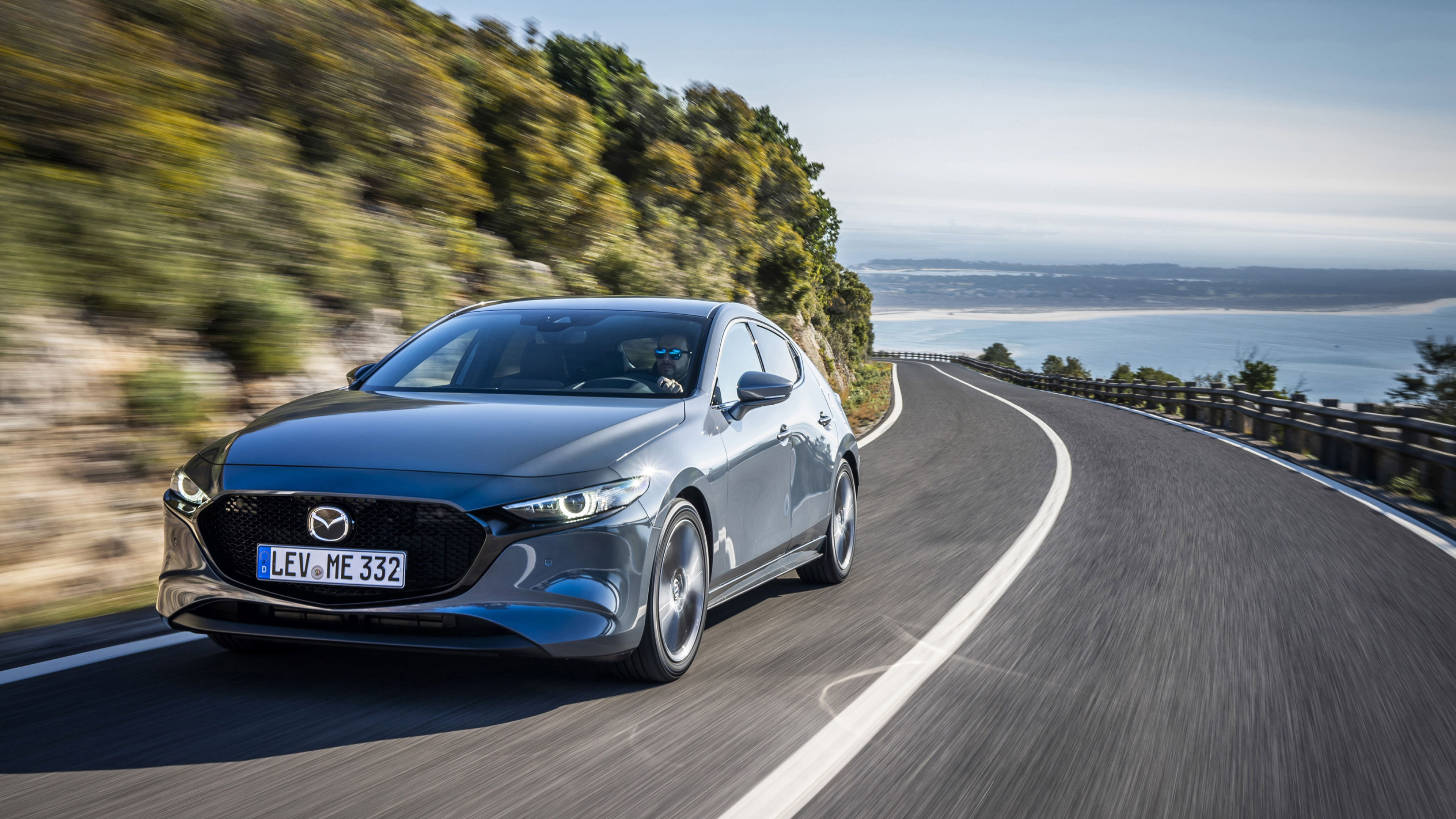 Mazda 3, Hatchback allure, Polymetal Grey Metallic, Sleek profile, 3840x2160 4K Desktop