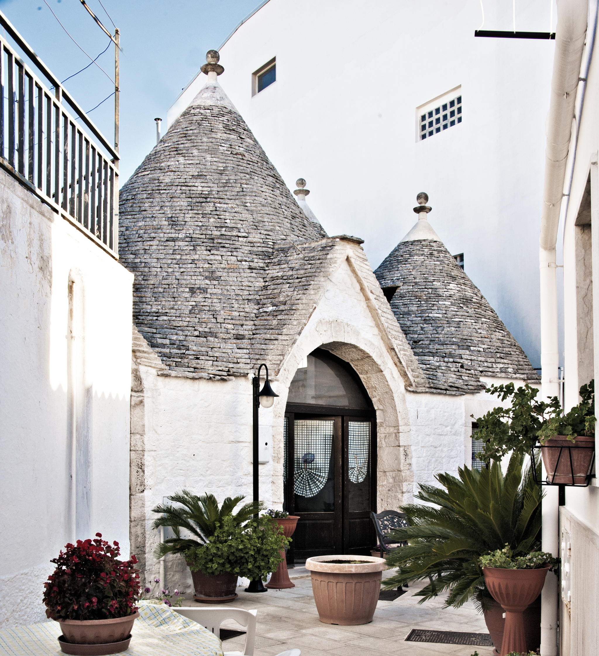 Italian fairytale town, Trulli houses, Charming streets, 2050x2250 HD Phone