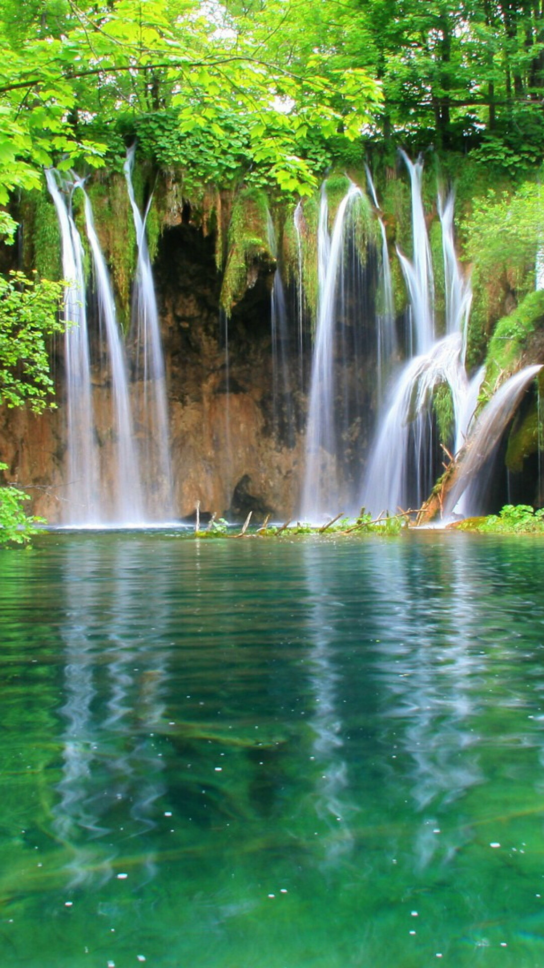 Mesmerizing waterfall in jungle, Serenity amidst greenery, Tranquil paradise, Nature's masterpiece, 1080x1920 Full HD Phone