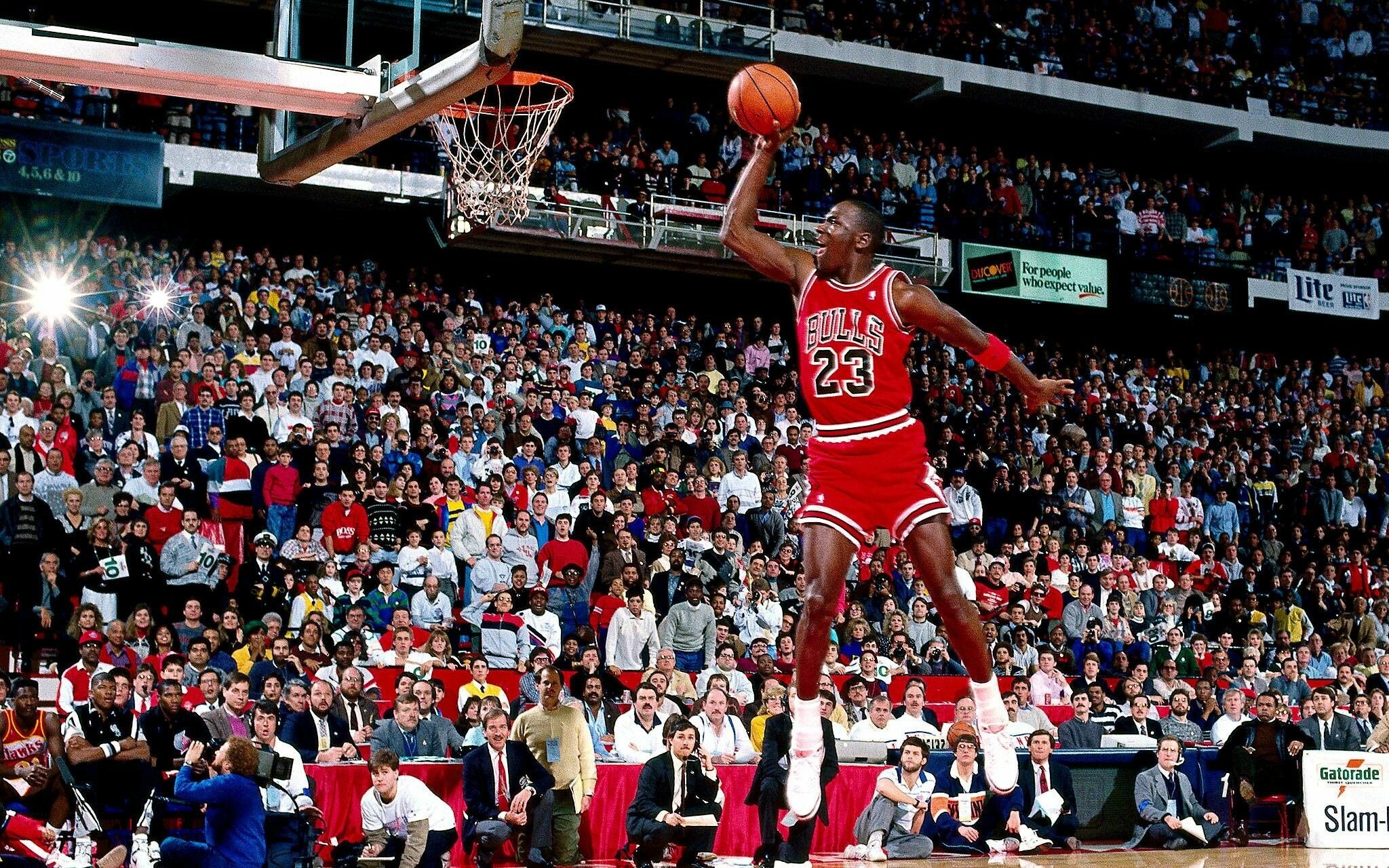 Michael Jordan, Epic dunk moments, High energy sports, Airborne athlete, 2050x1280 HD Desktop