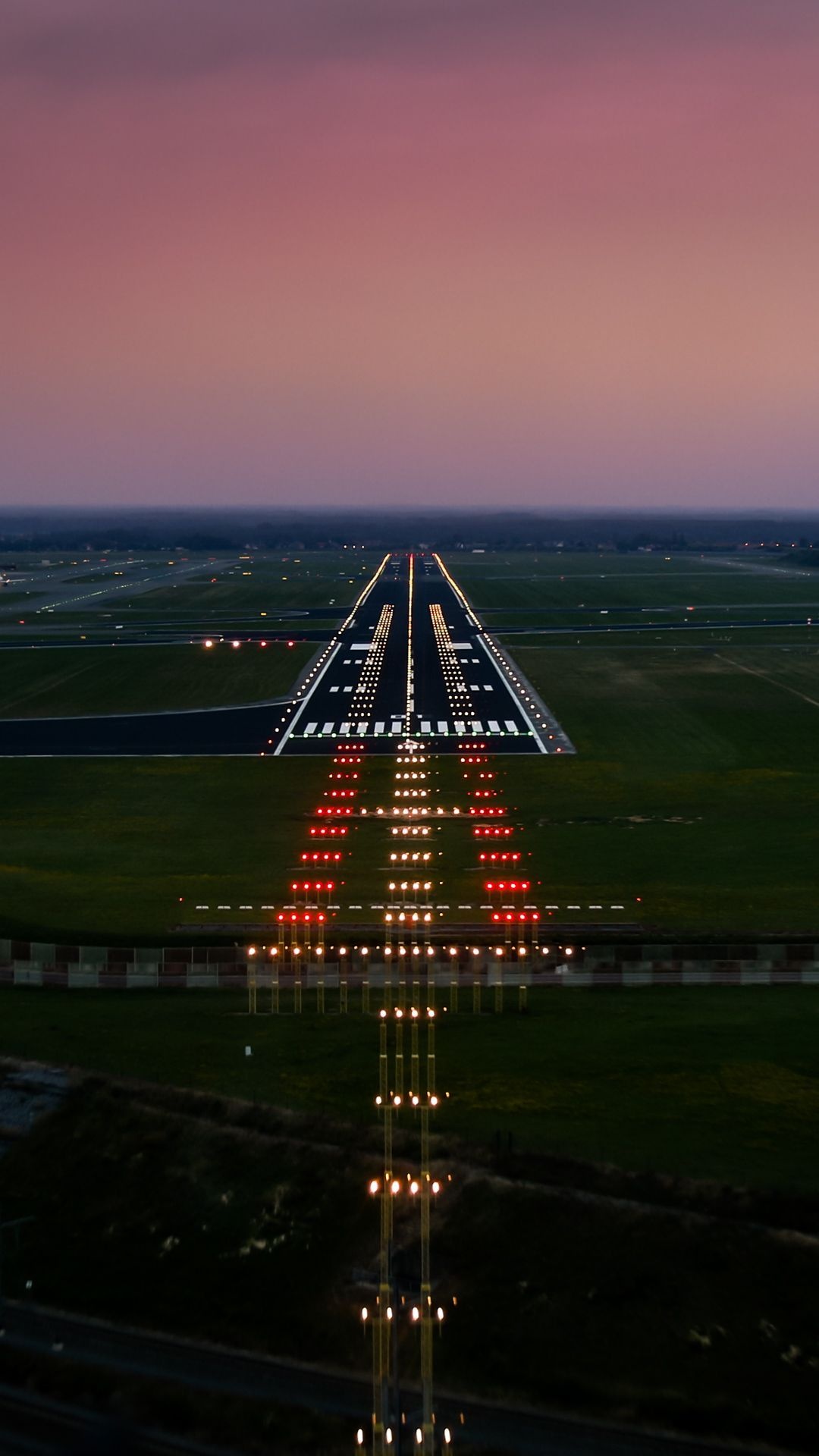 Airplane runway, Urban backdrop, Commercial flights, Terminal buildings, 1080x1920 Full HD Phone