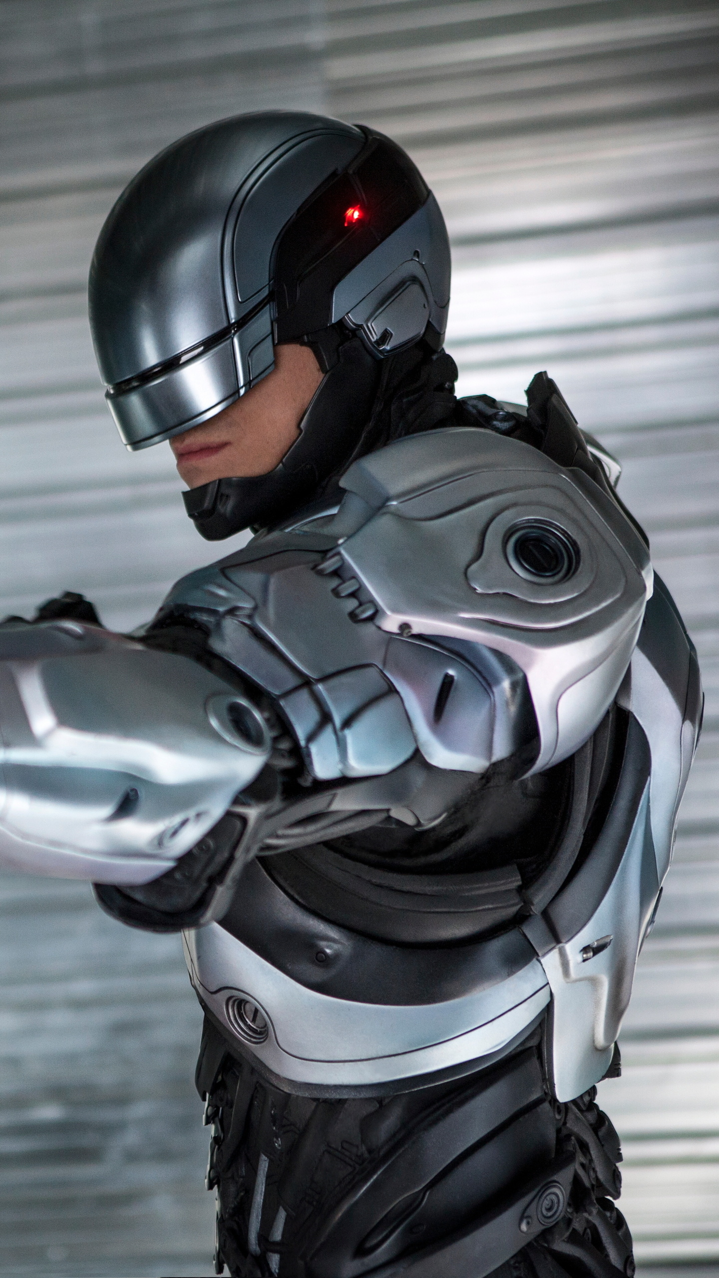 Movie RoboCop, Futuristic law enforcement, High-tech cityscape, Sci-fi action, 1440x2560 HD Phone